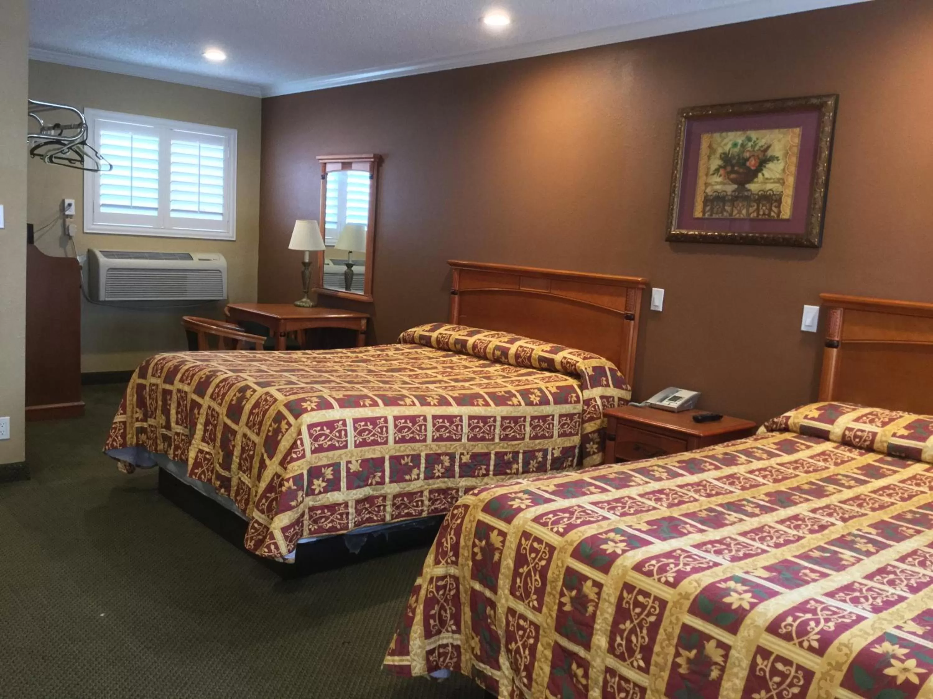 Bed in Bevonshire Lodge Motel