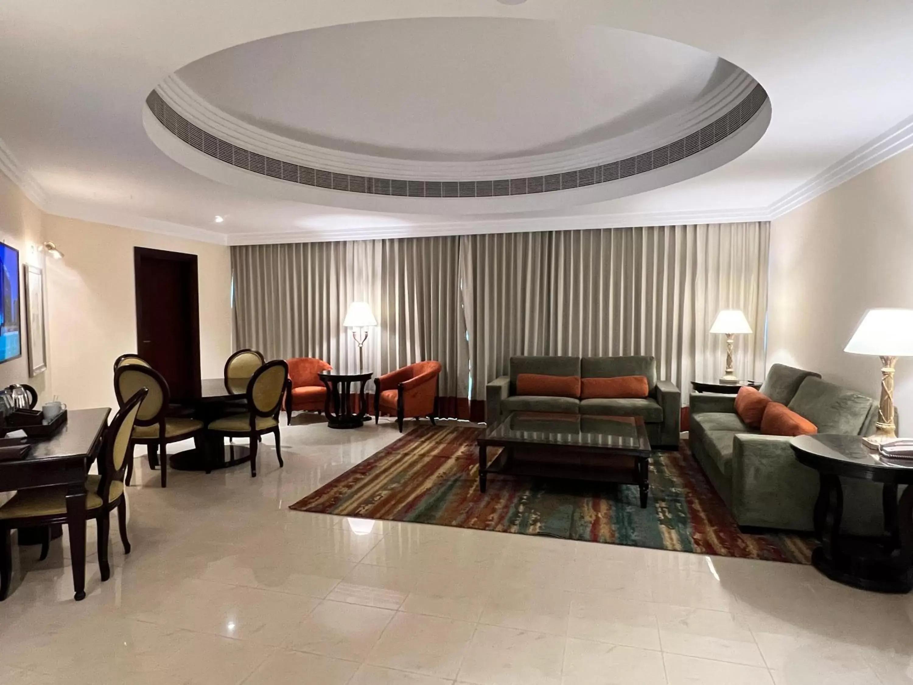 Living room, Seating Area in City Seasons Suites