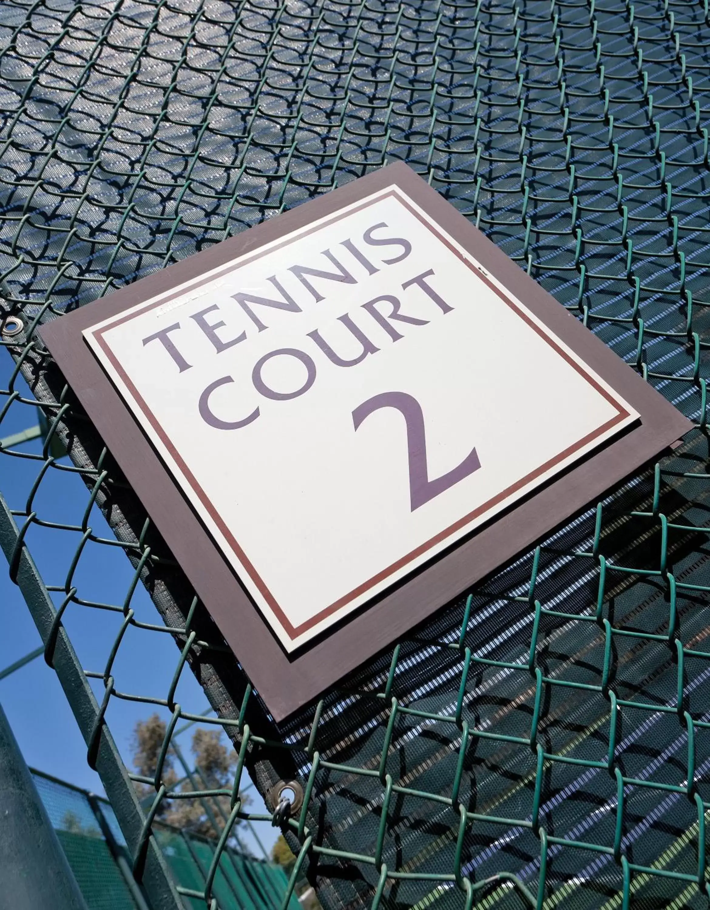 Tennis court in The Legacy Golf Resort
