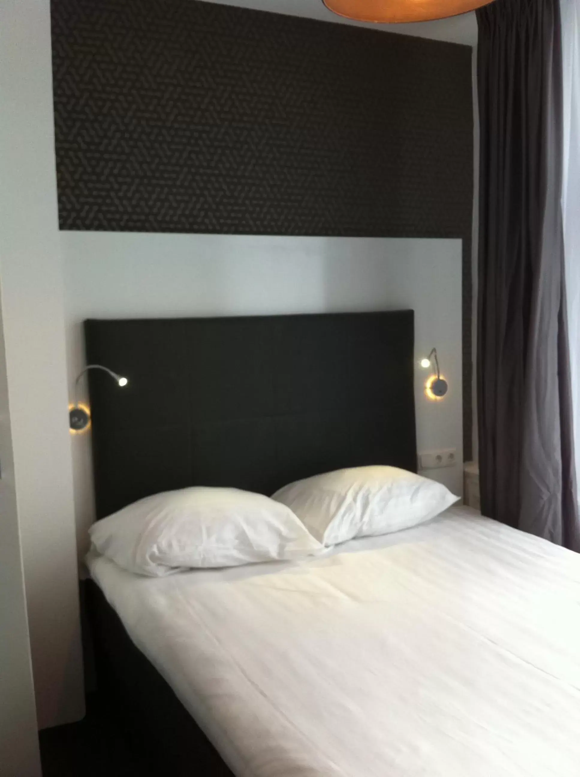 Bed in Hotel Vossius Vondelpark