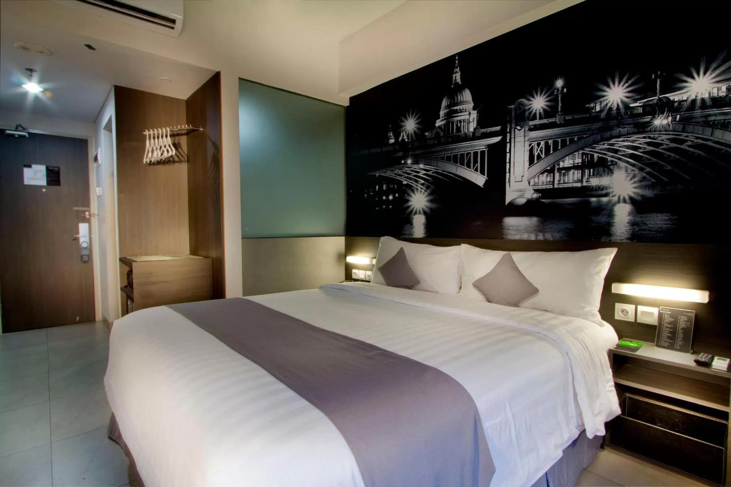 Lobby or reception, Bed in Neo Hotel Tendean Jakarta by ASTON