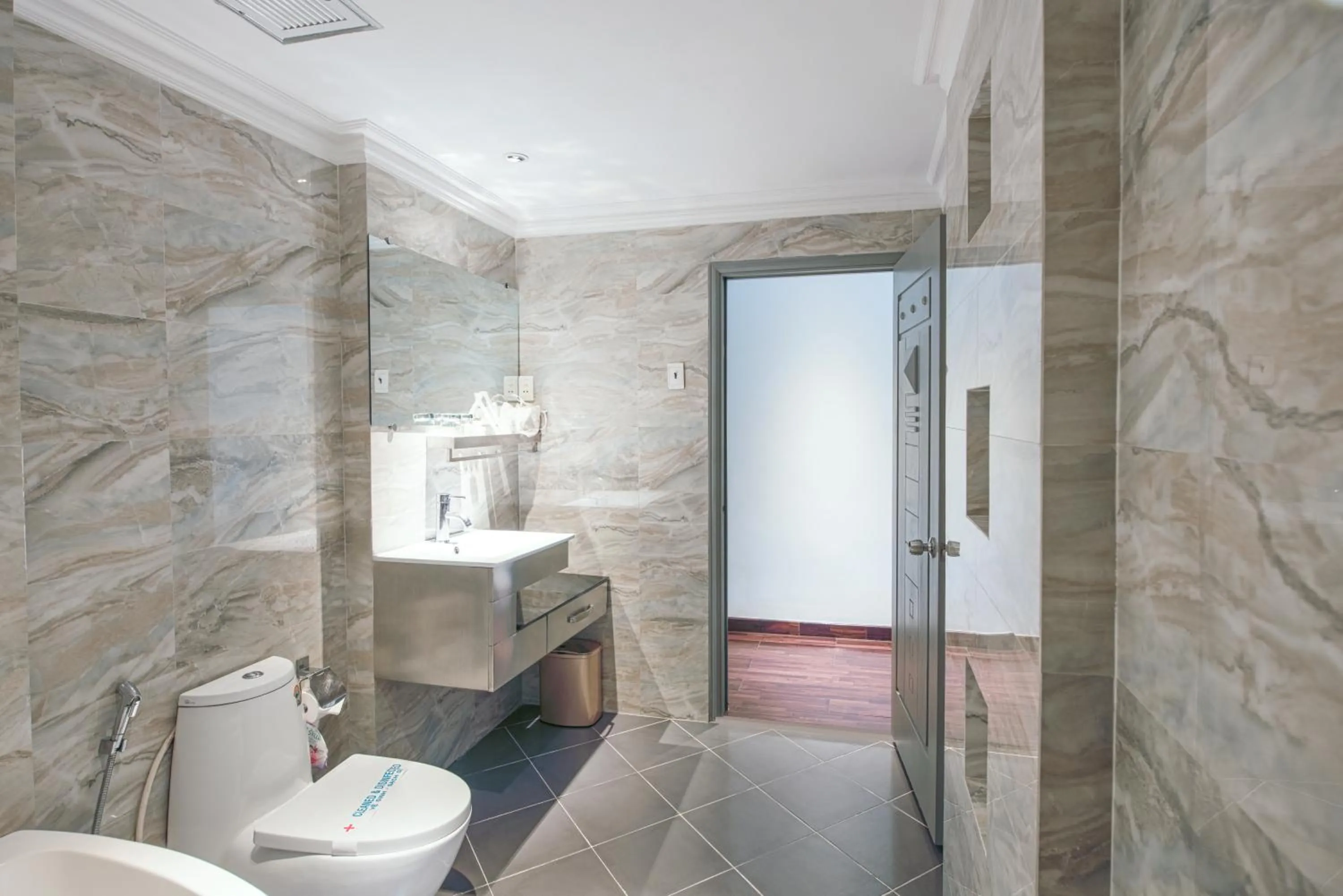 Toilet in A&EM - The Petit Hotel