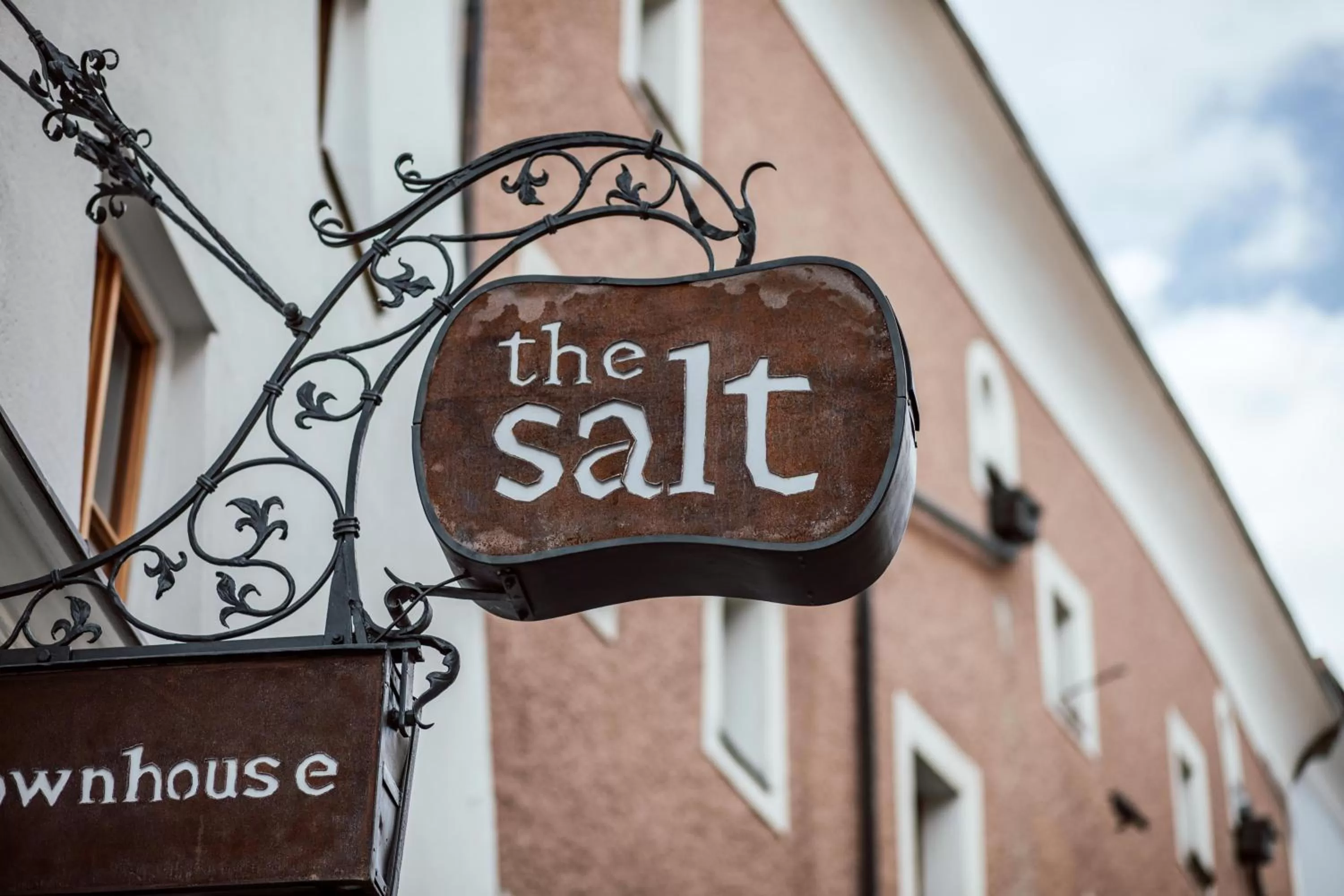 Property logo or sign in the salt townhouse