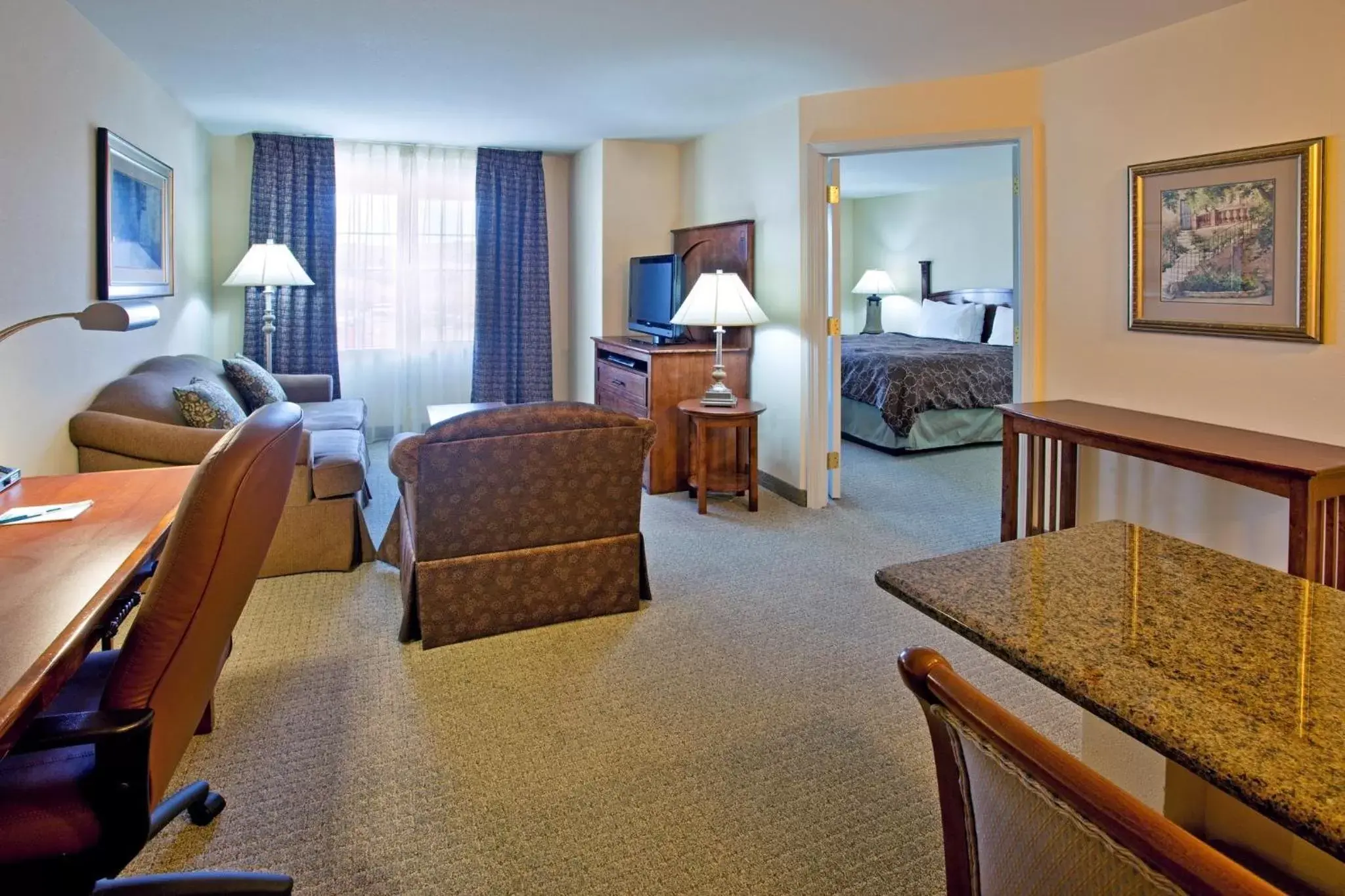 Photo of the whole room, Seating Area in Staybridge Suites - Albuquerque Airport, an IHG Hotel