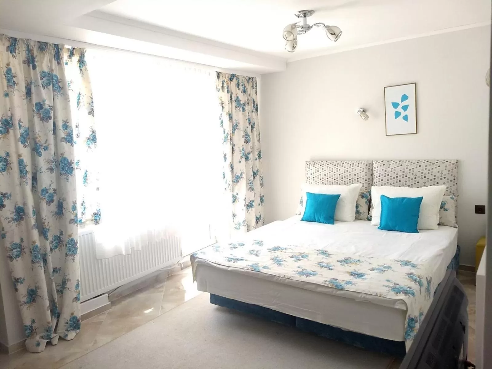 Bed in White Rose Guest Rooms