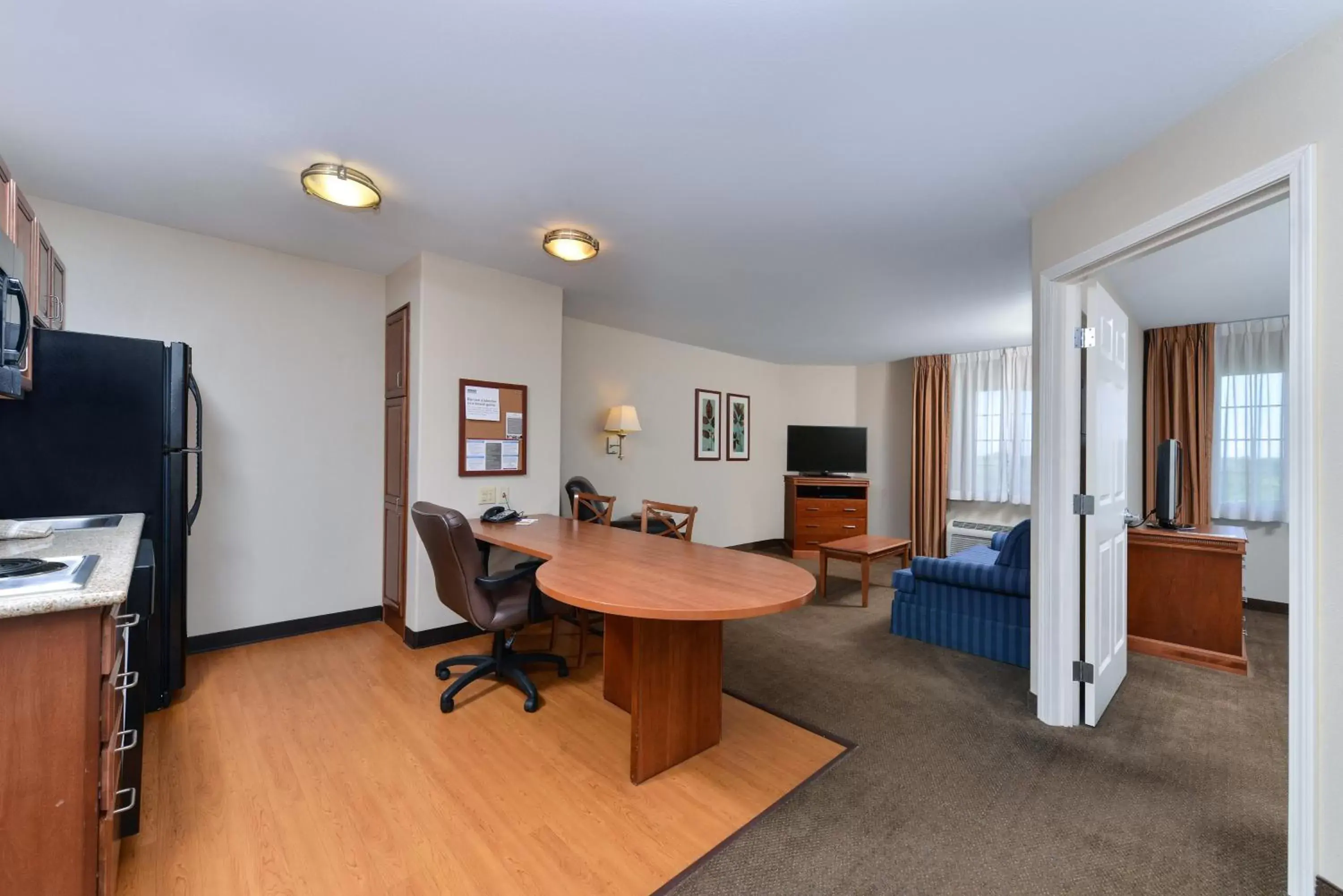 Photo of the whole room, TV/Entertainment Center in Candlewood Suites Roswell, an IHG Hotel