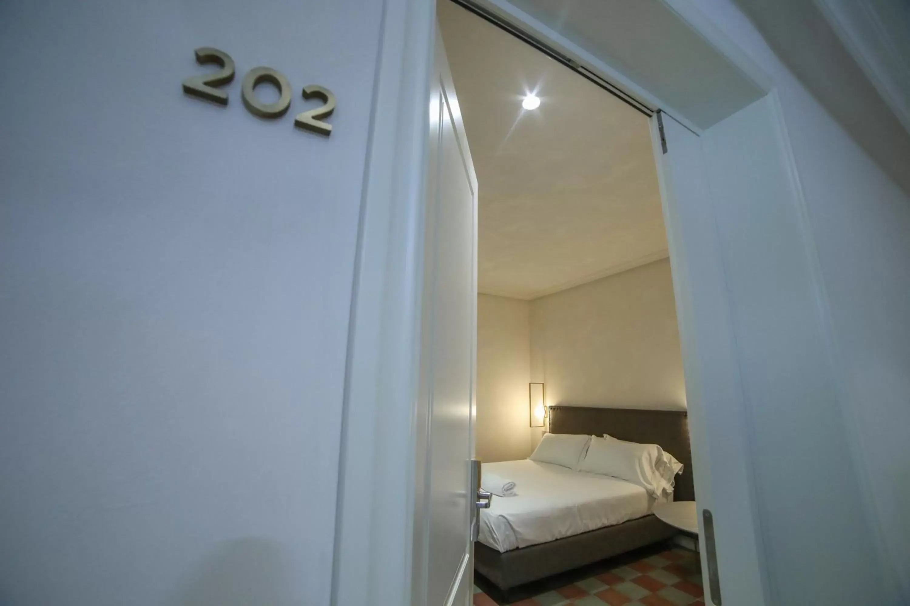 Bedroom in 20 Miglia Boutique Hotel