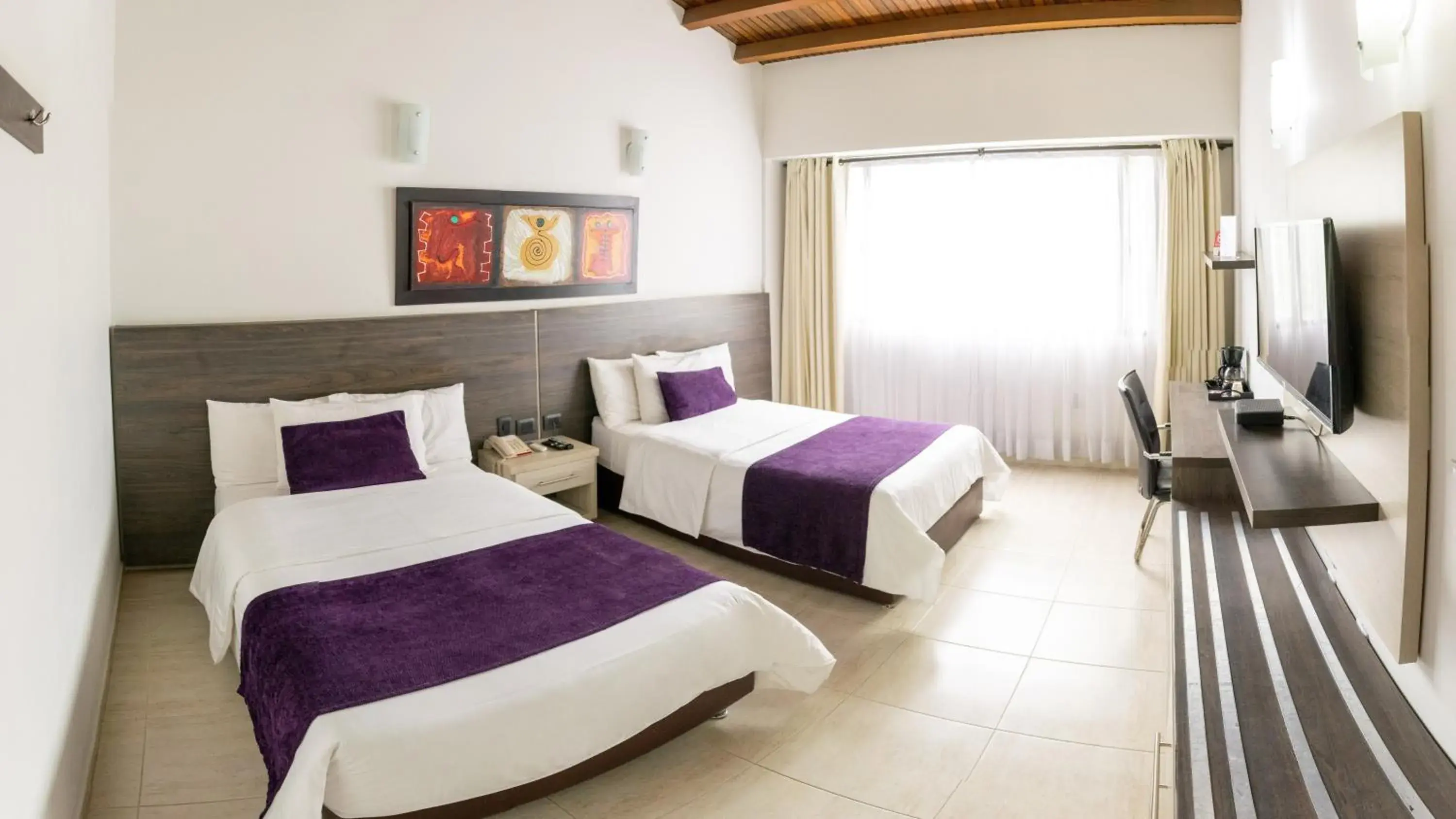 Bed in Hotel San Juan Internacional