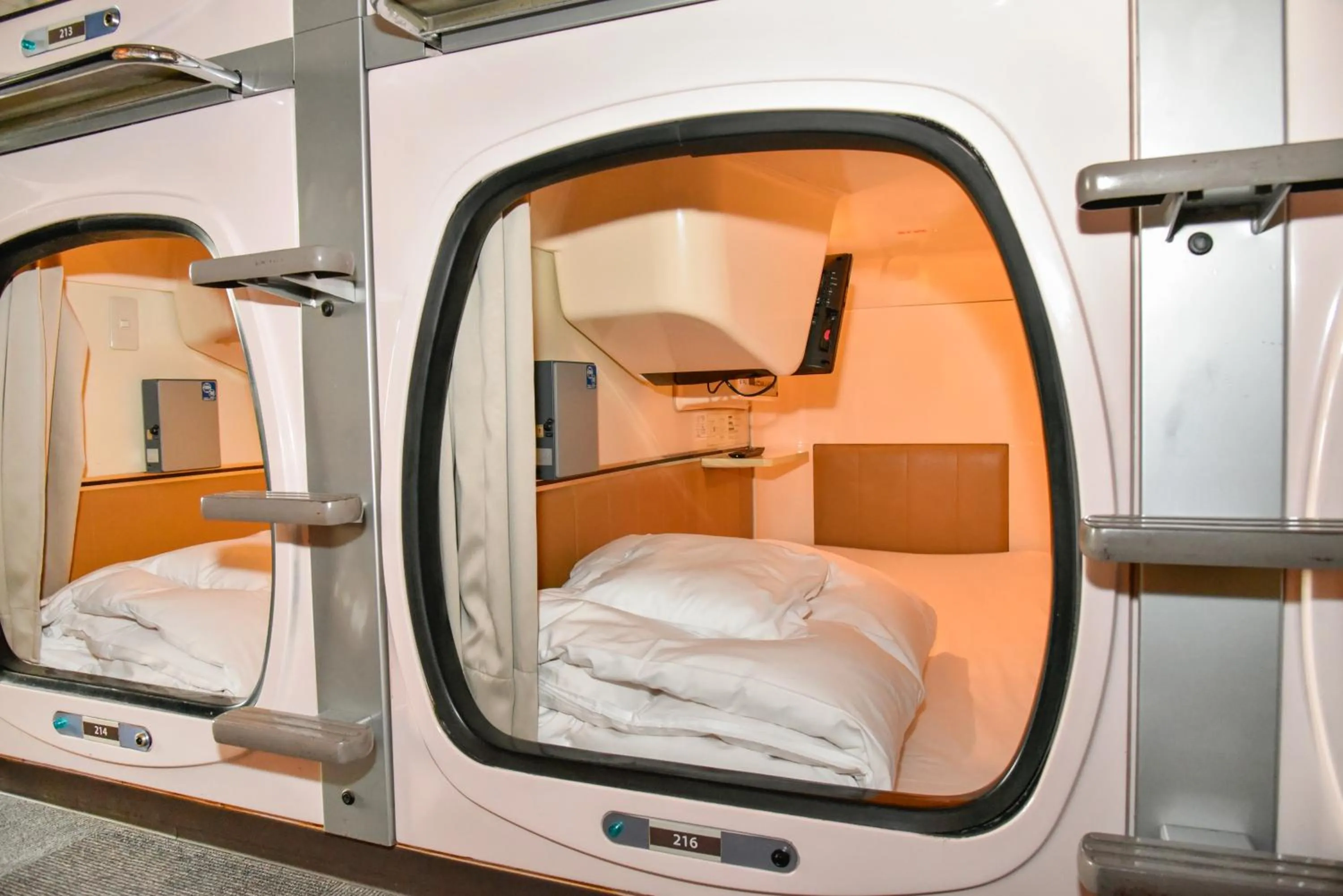 Bed in Hotel Palms Tenmonkan