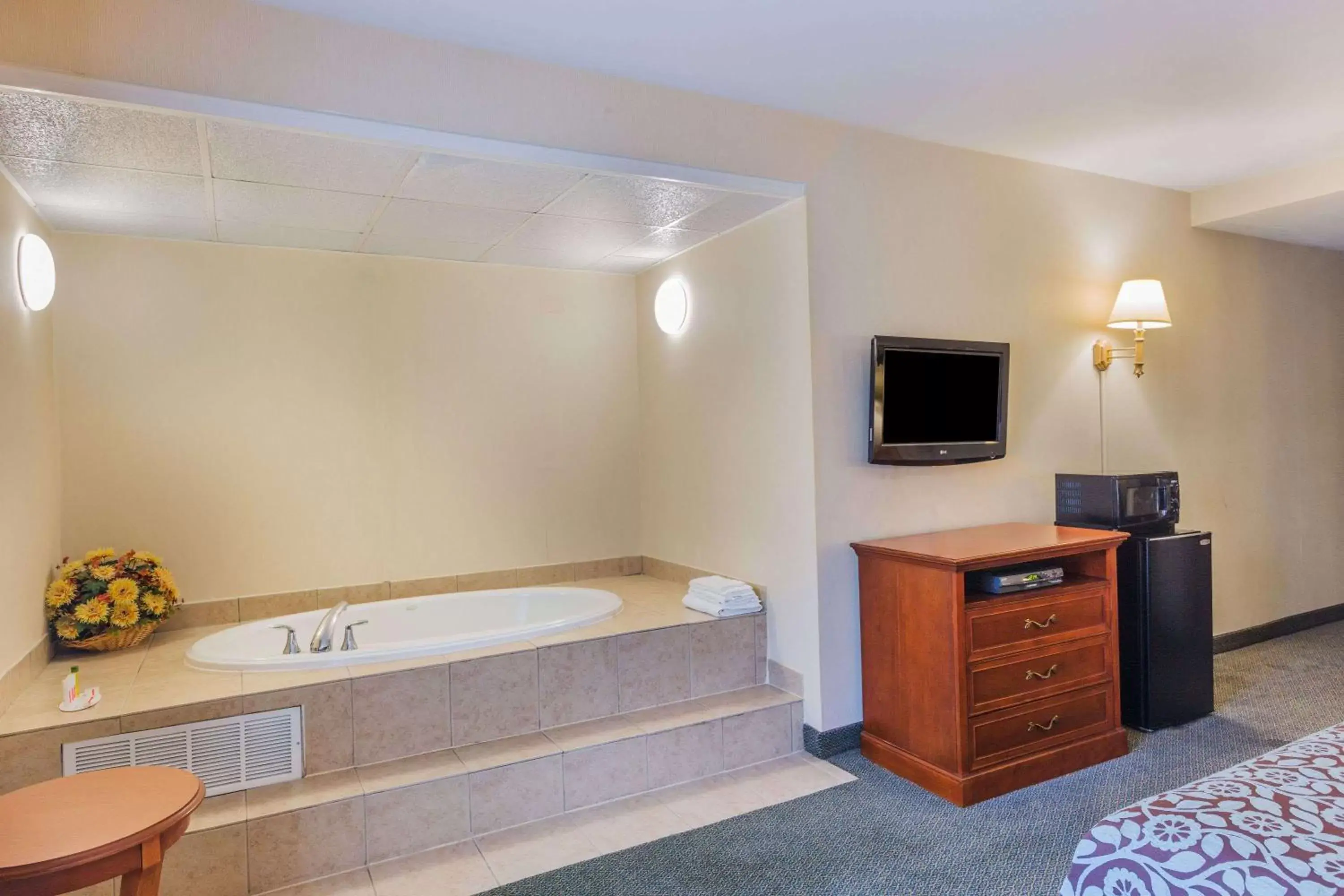 Photo of the whole room, TV/Entertainment Center in Days Inn by Wyndham Budd Lake