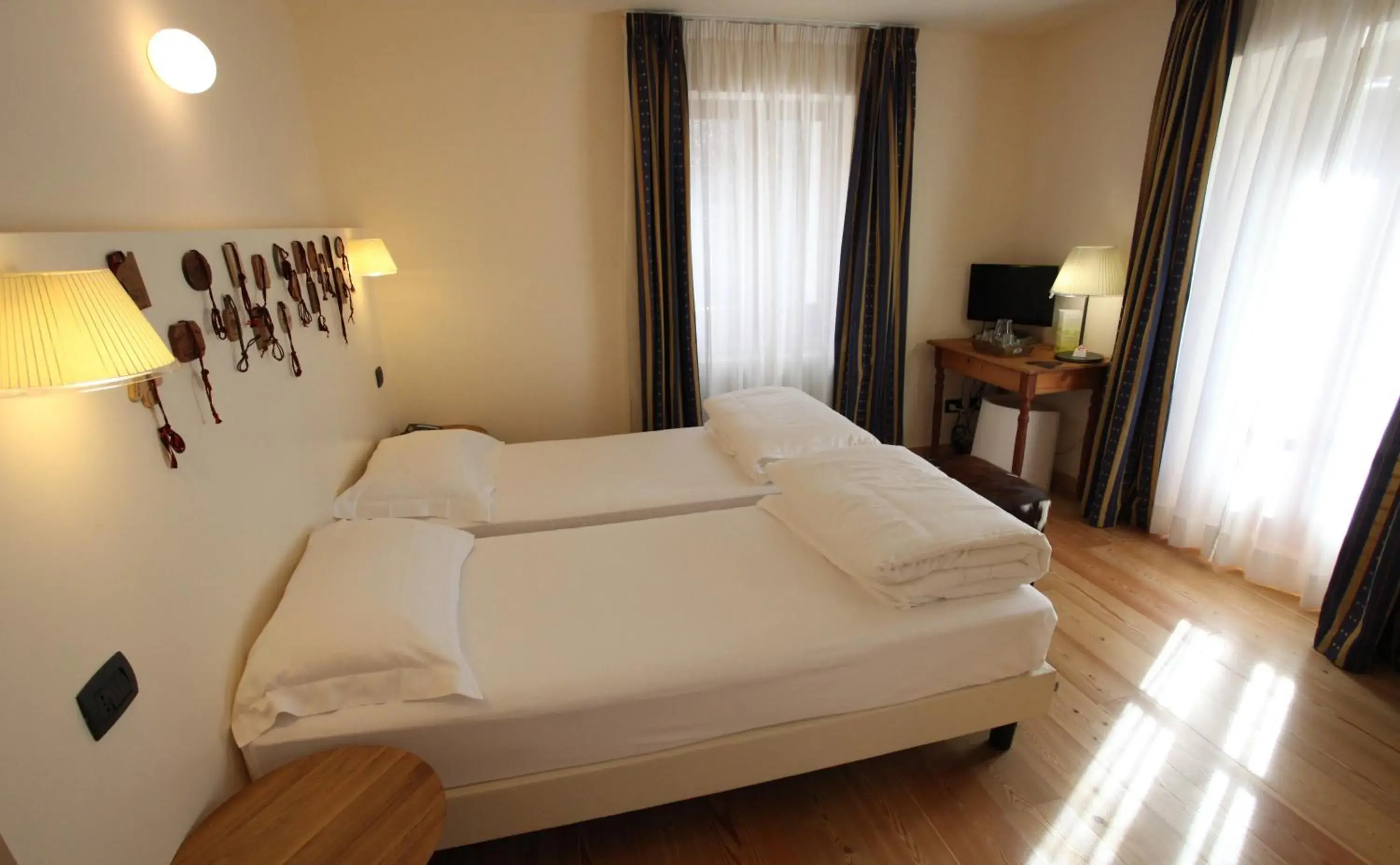 Bed in Hotel Berthod