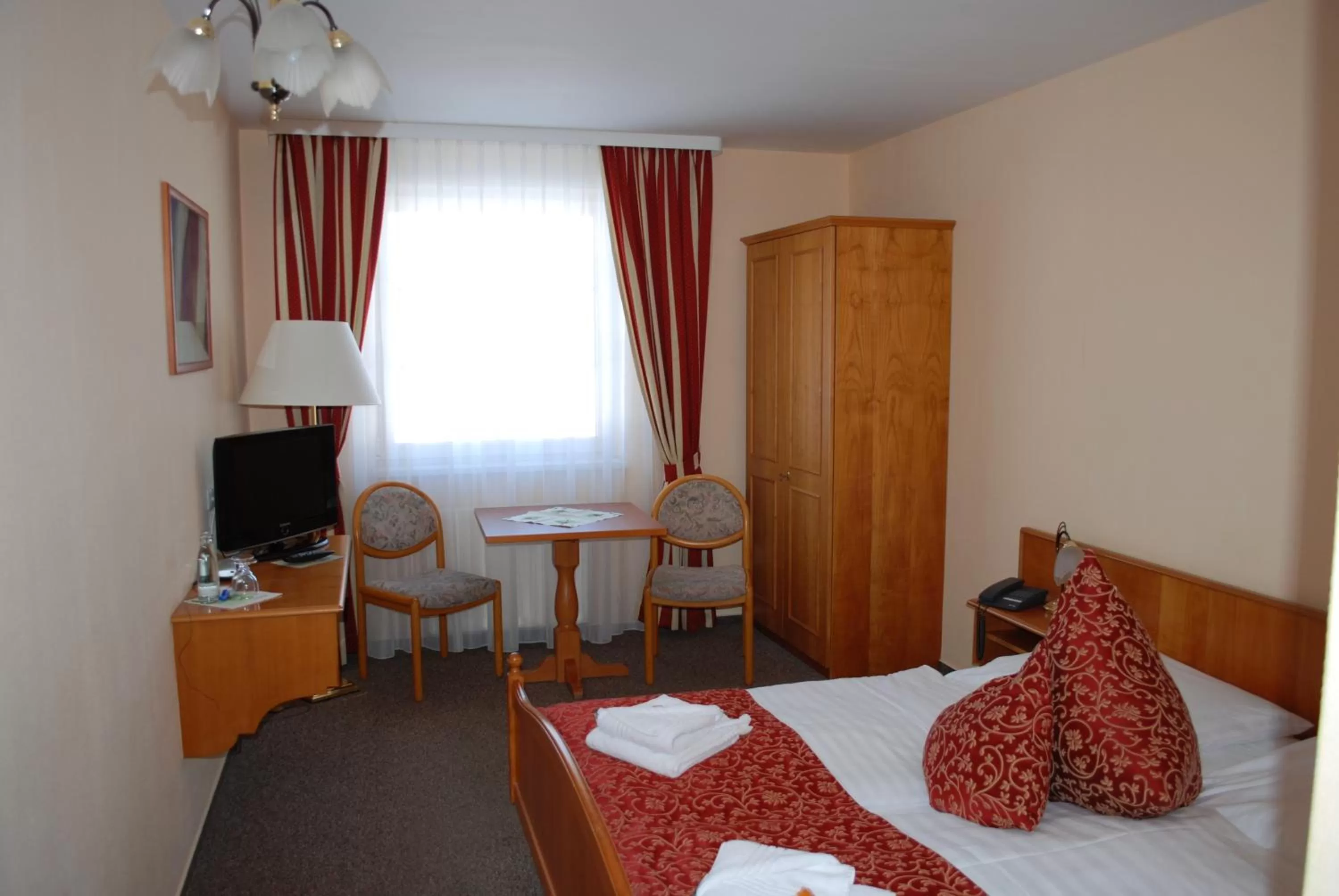 Photo of the whole room, Bed in Hotel Auerhahn