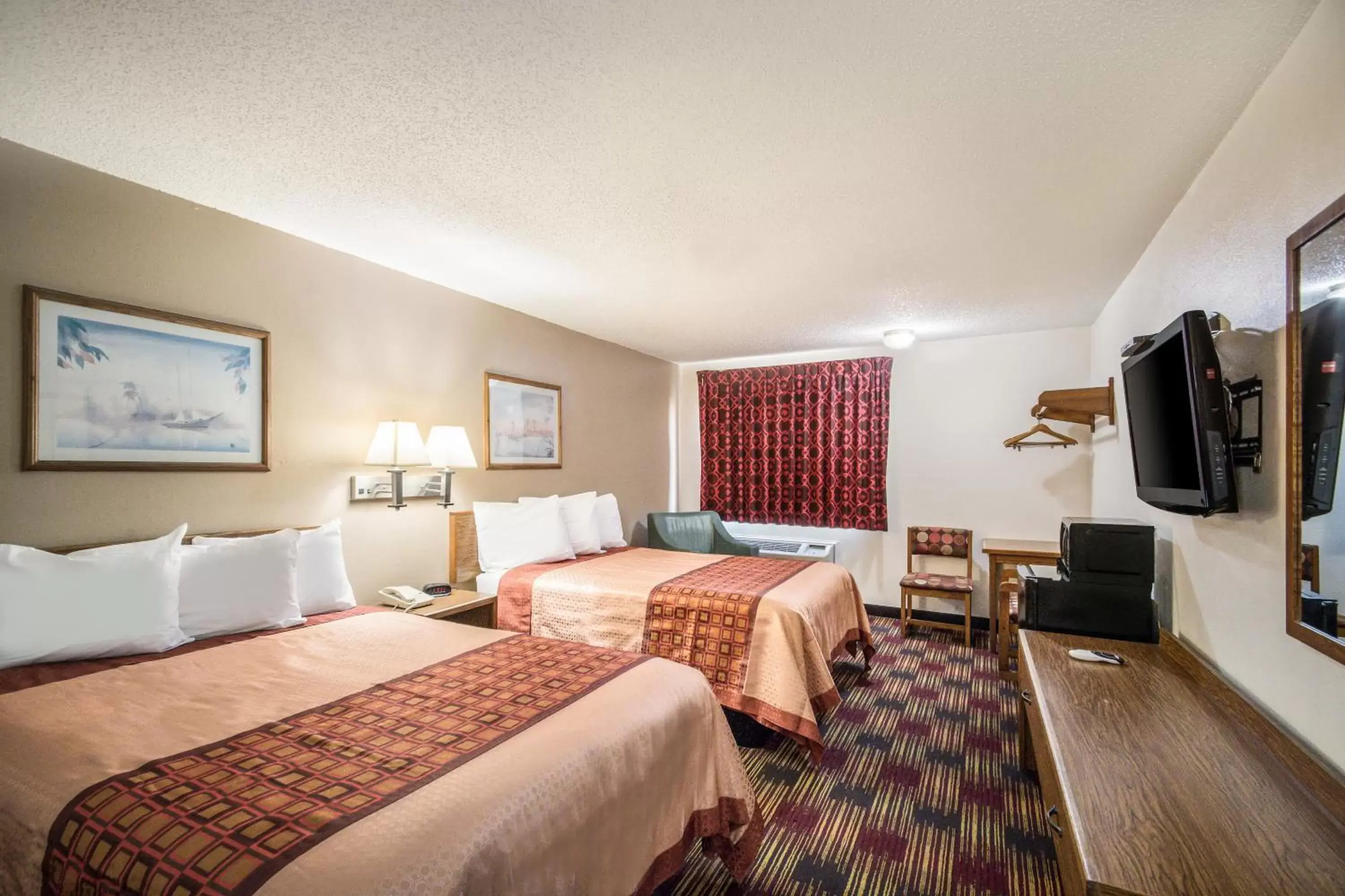 Bed in Americas Best Value Inn & Suites Harrisonville