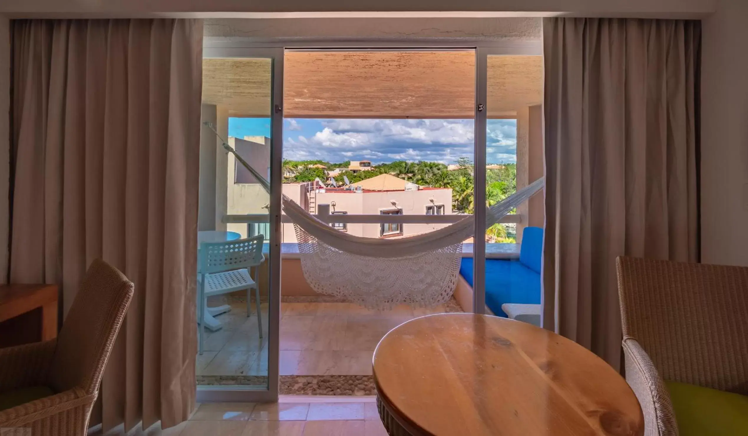 Living room, Pool View in Puerto Aventuras Hotel & Beach Club