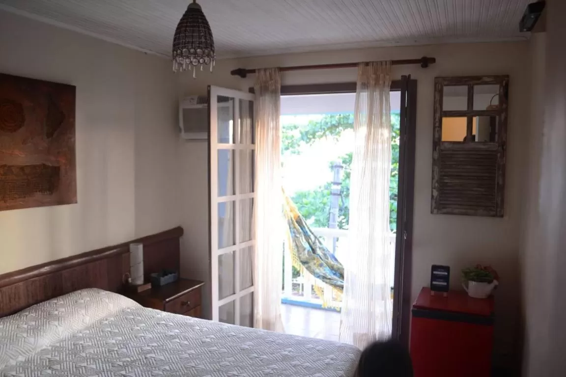 Bed in Pousada L'escale