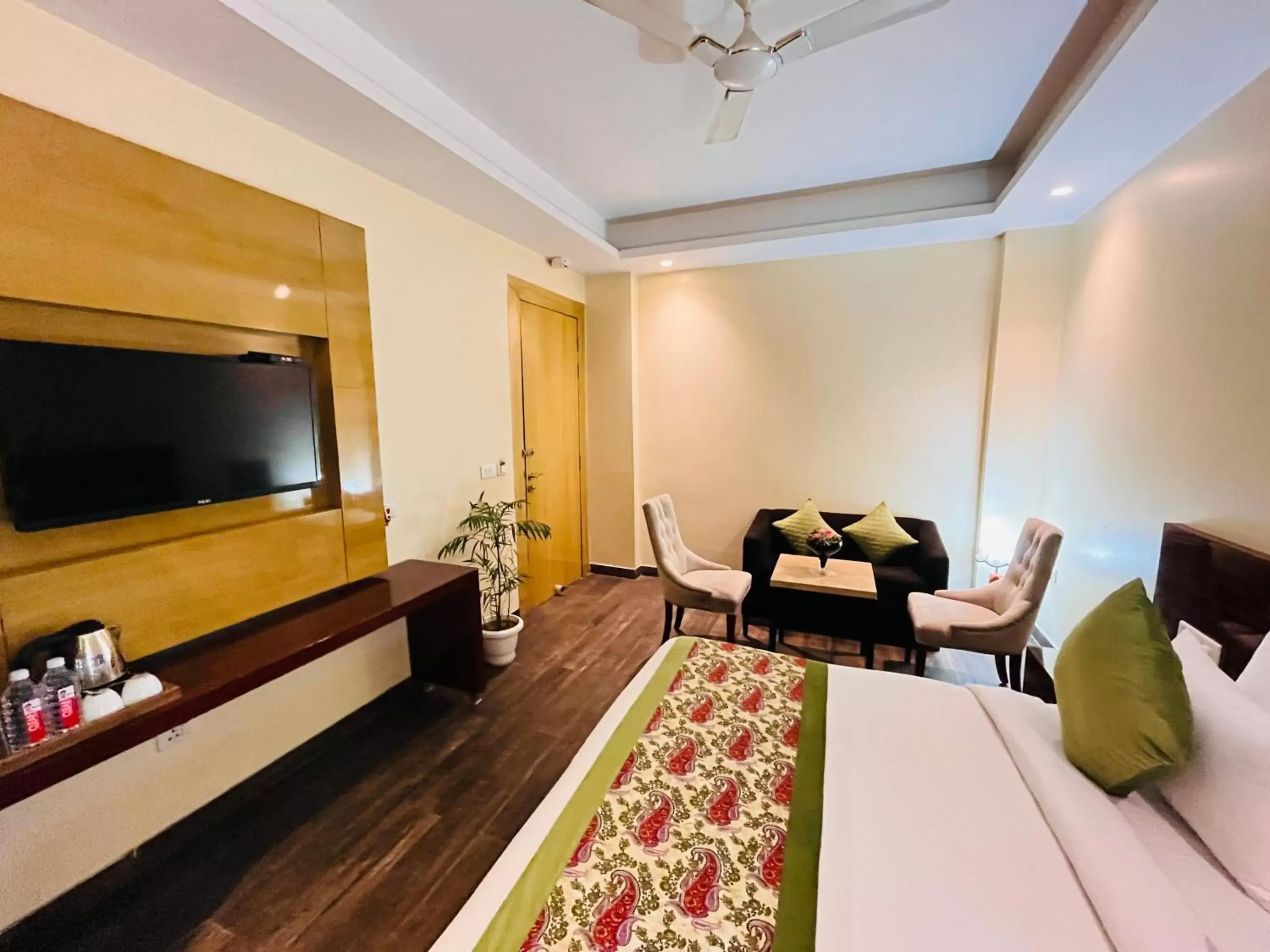 Bed, Seating Area in Hotel Banz - Near Delhi International Airport