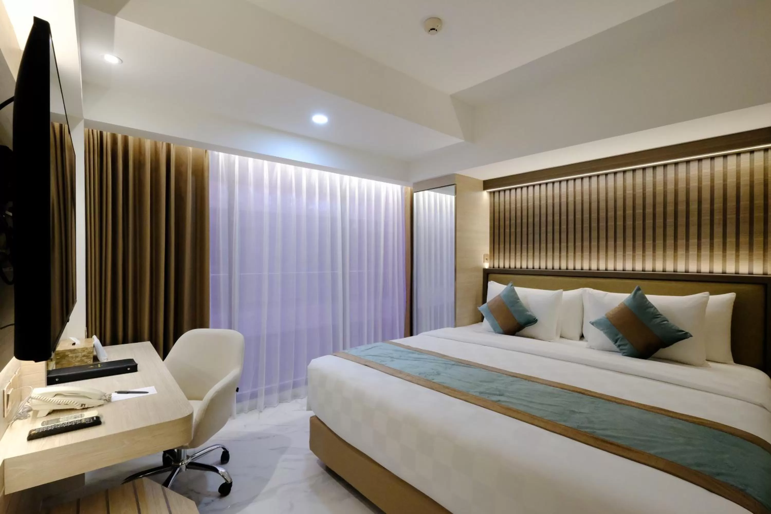 Bed in Dream of Aventus Hotel Kuta