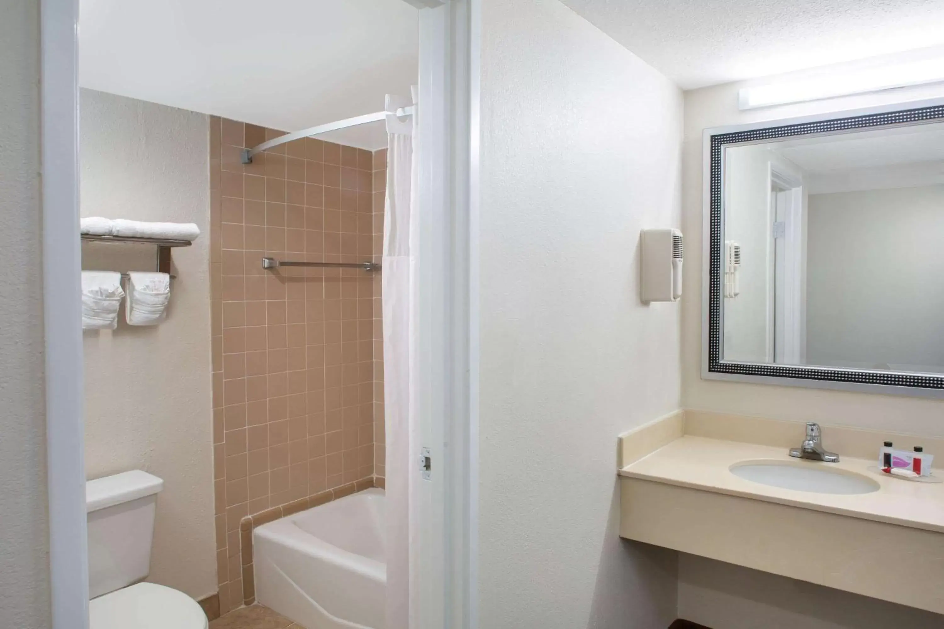 Bathroom in Days Inn & Suites by Wyndham Tallahassee Conf Center I-10