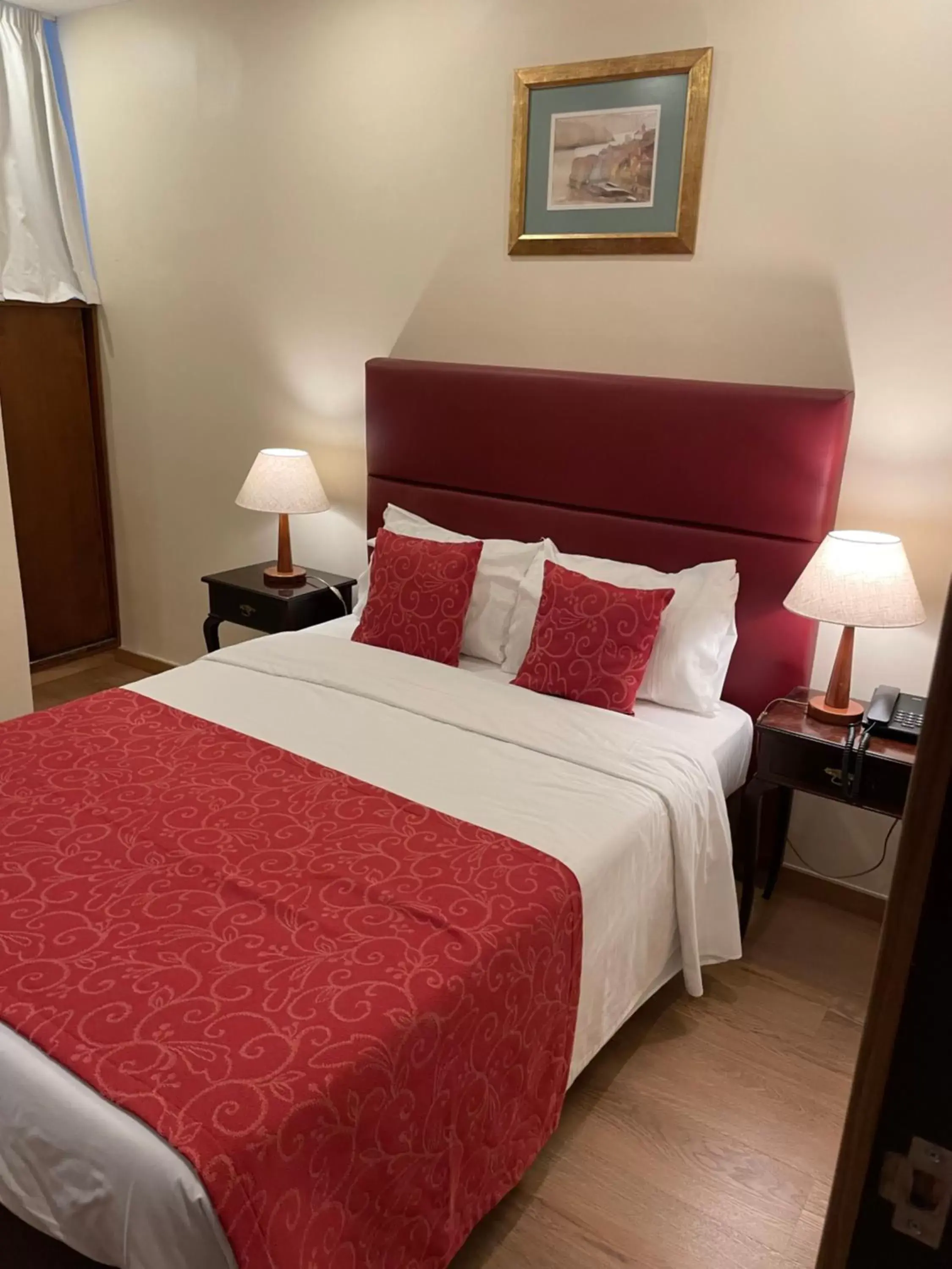 Bed in Pao de Acucar Hotel