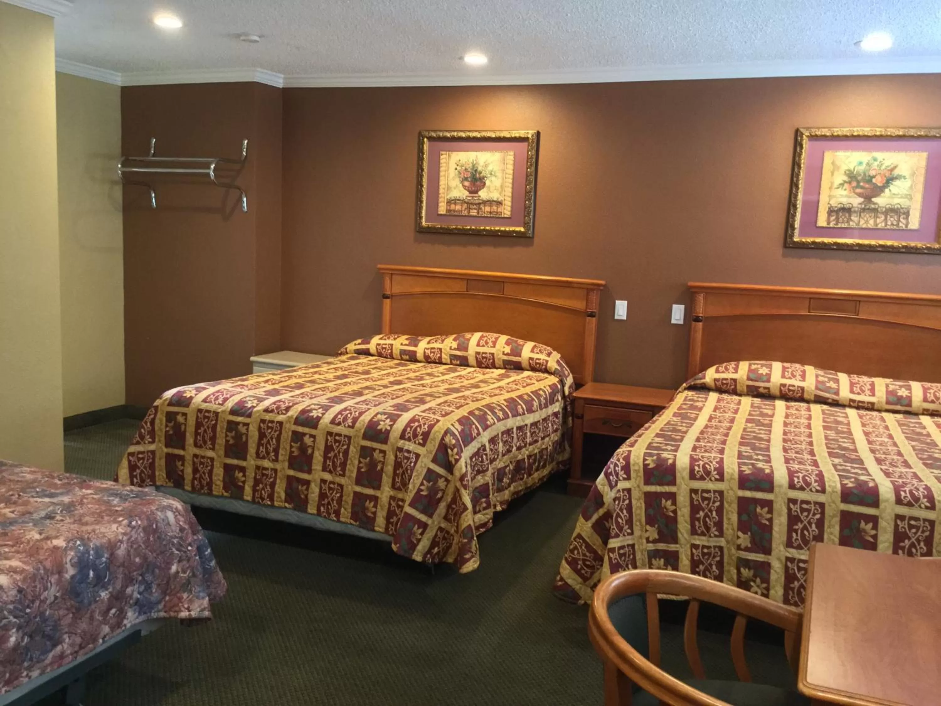 Bed in Bevonshire Lodge Motel