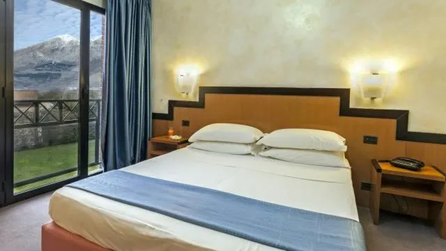 Photo of the whole room, Bed in Hotel Olimpia