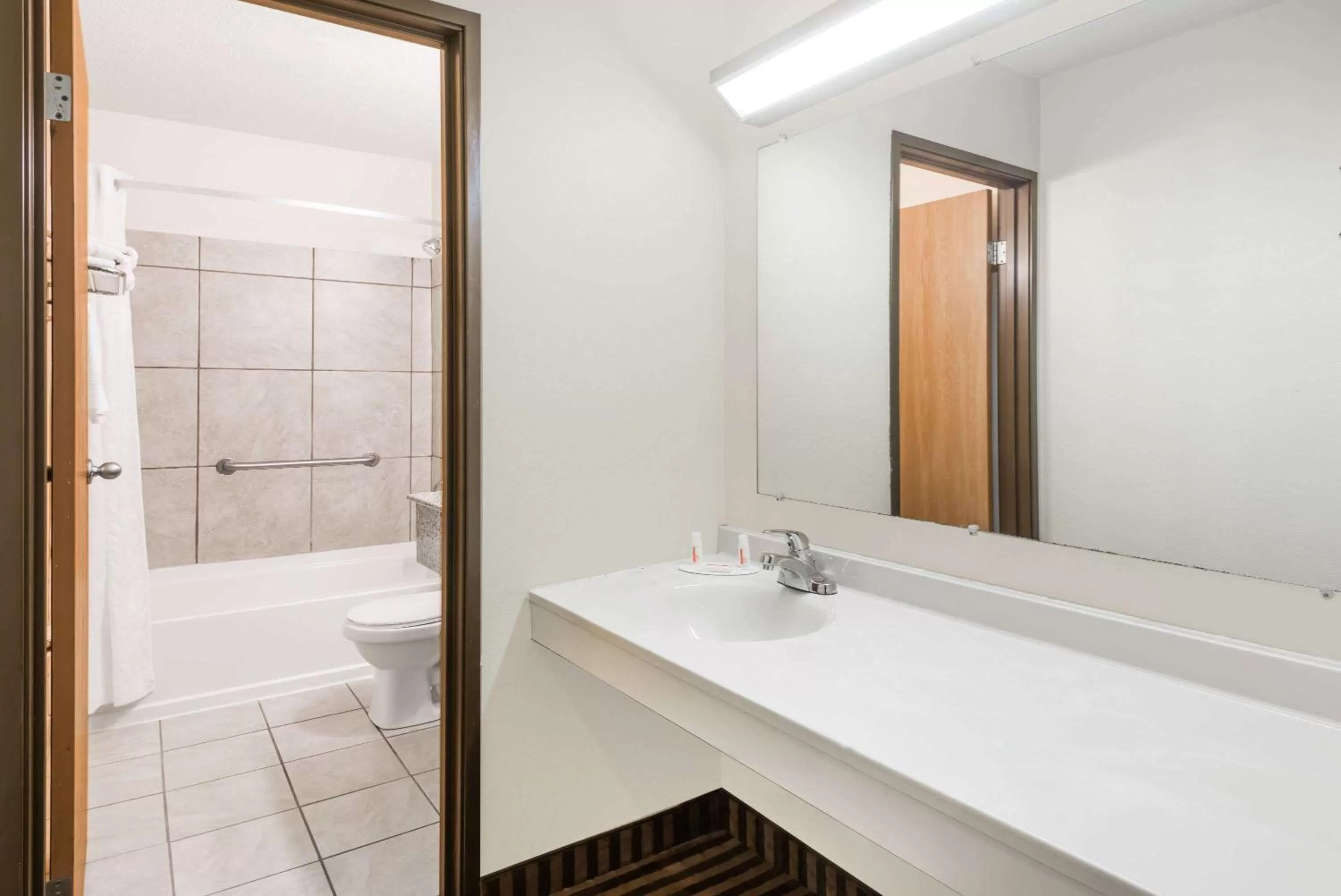 Bathroom in Super 8 by Wyndham La Vale/Cumberland Area
