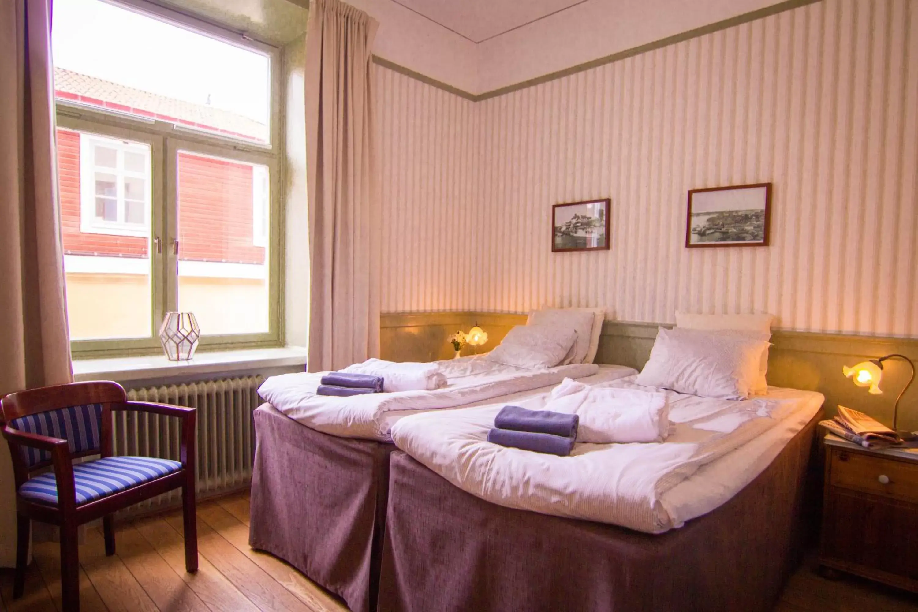 Photo of the whole room, Bed in Waxholms Hotell Photo of the whole room, Bed in Waxholms Hotell