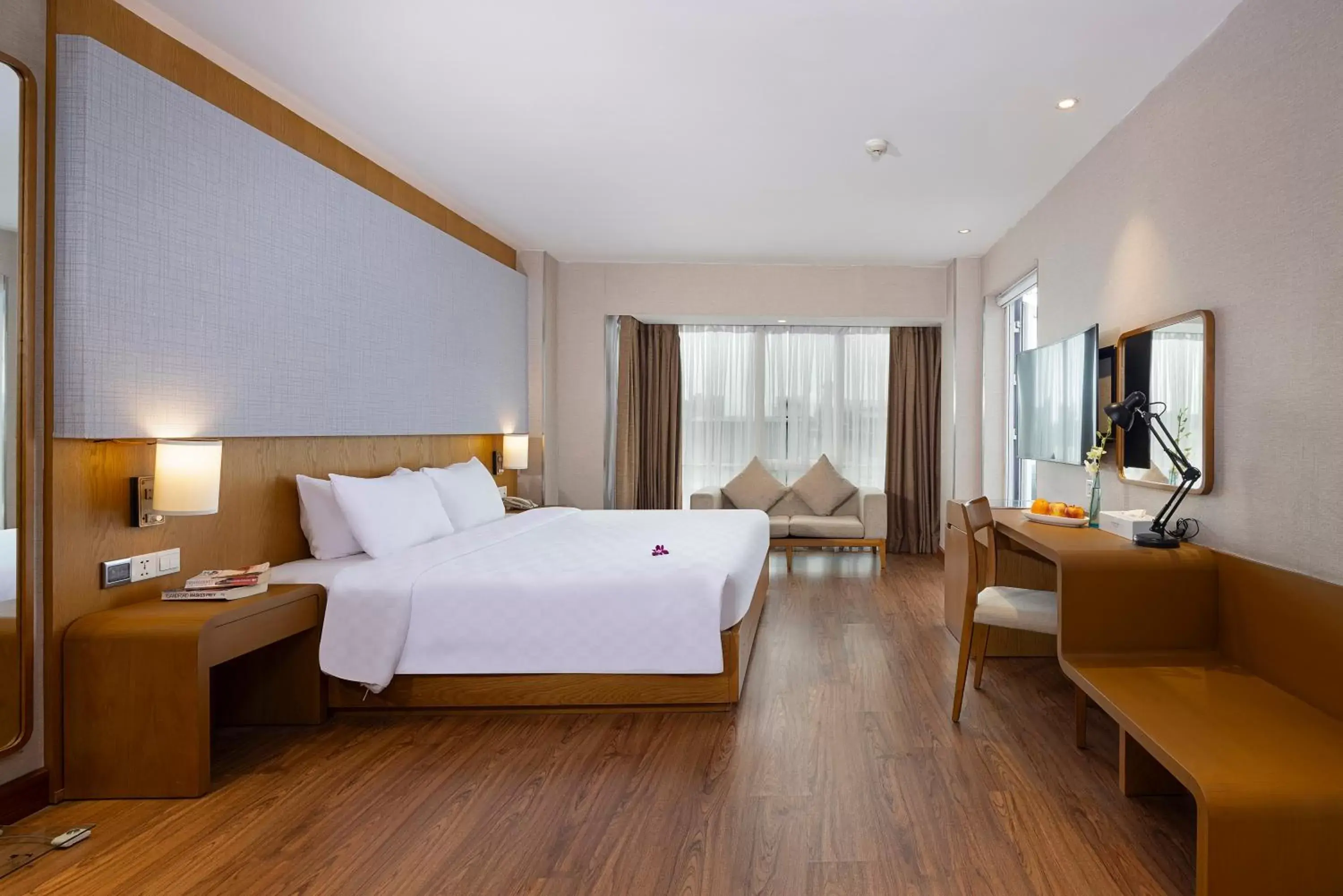 Bedroom in Harmony Saigon Hotel & Spa