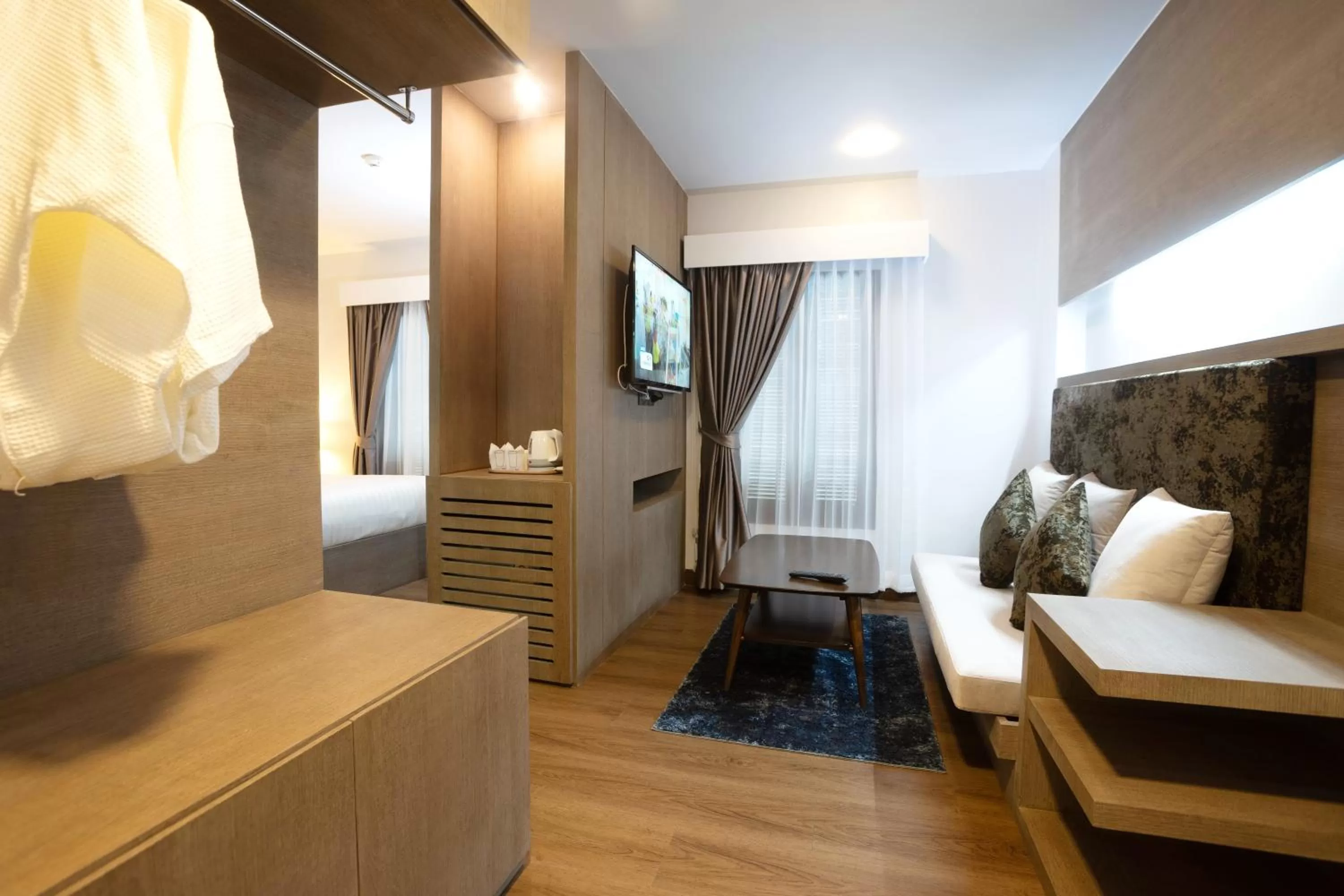 Living room, Bed in Marigold Lanna