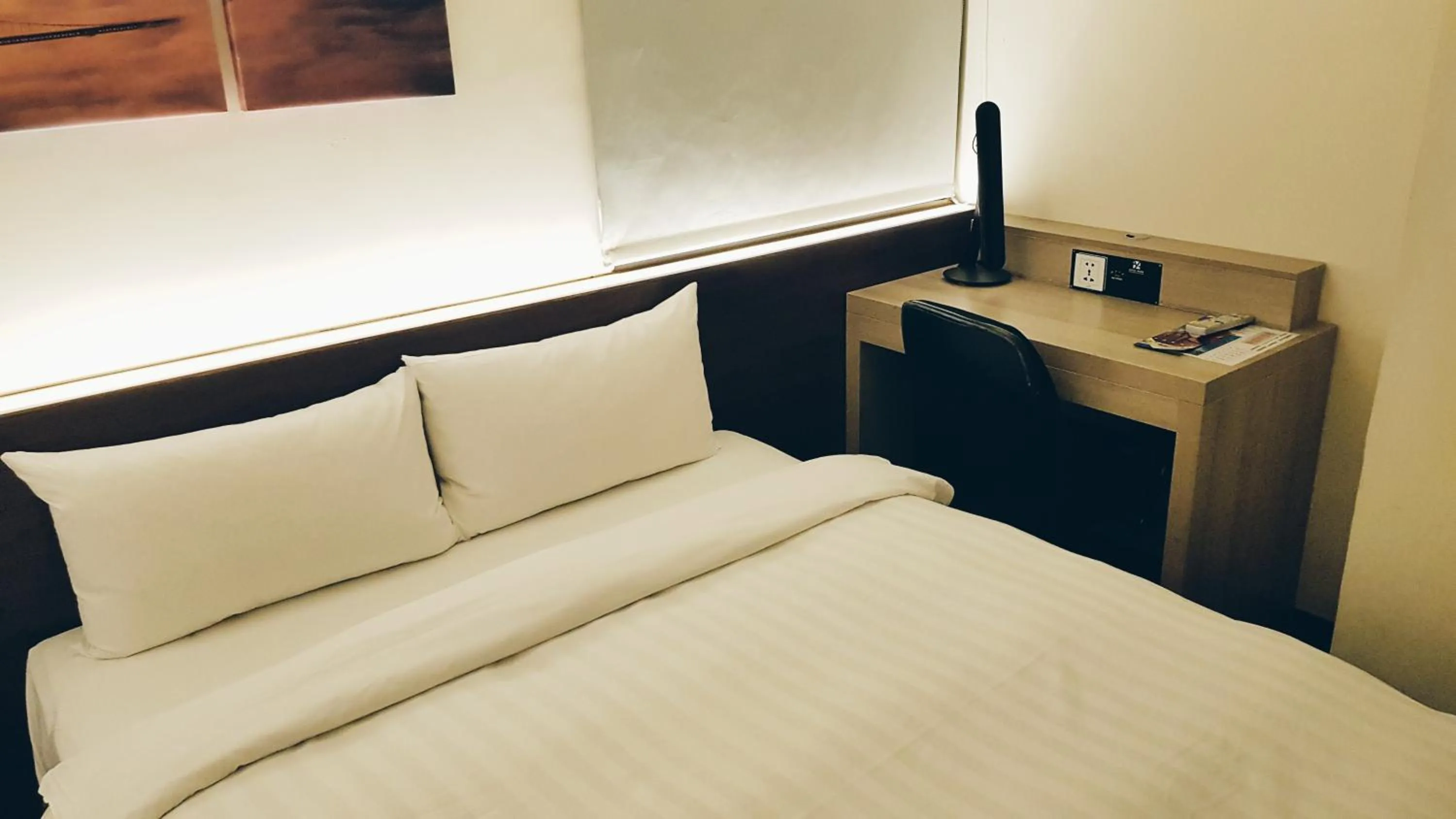 Bed in Audi Garden Business Hotel