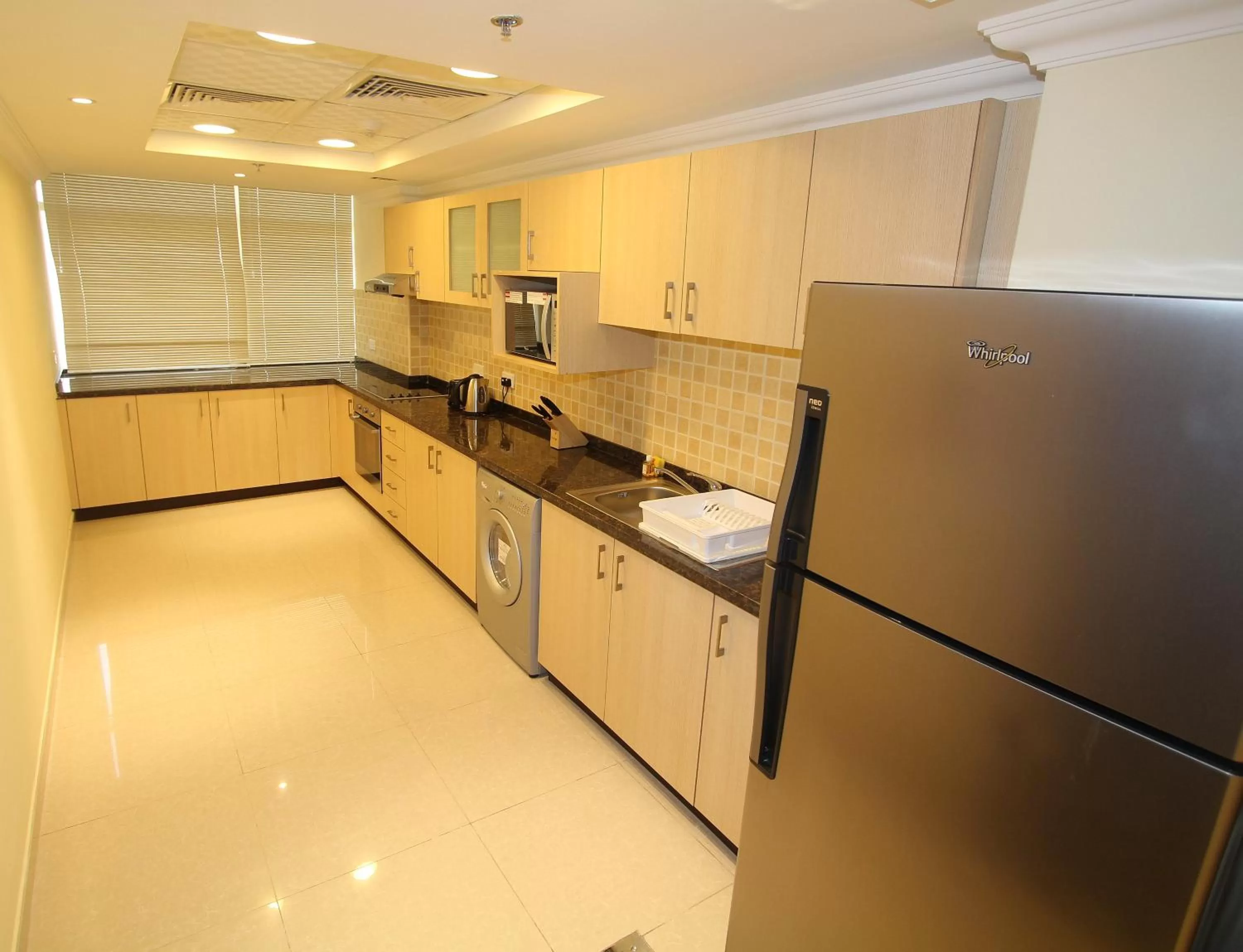 Kitchen or kitchenette in Ivory Grand Hotel Apartments