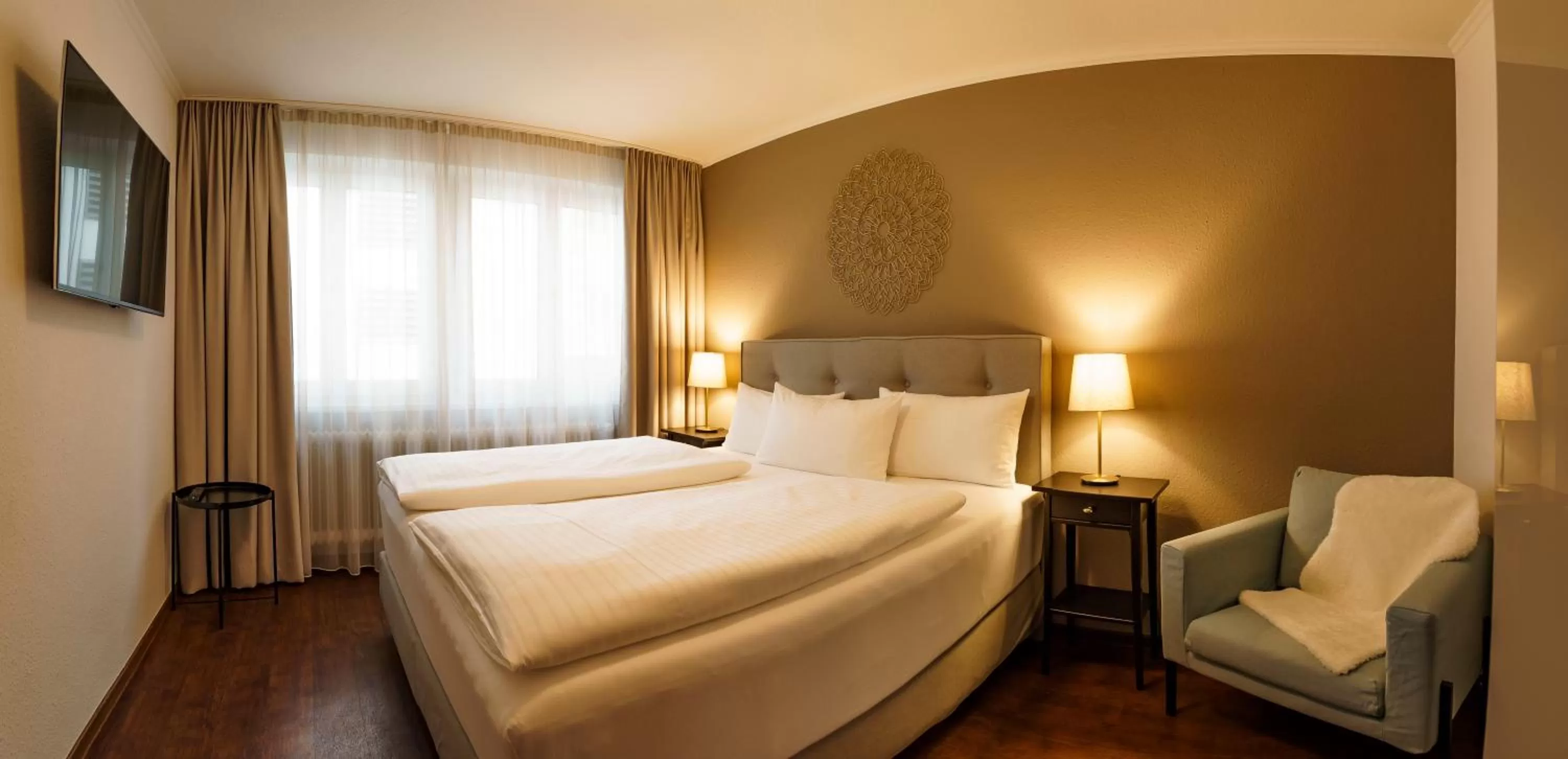 Bed in Hotel Rappen am Münsterplatz