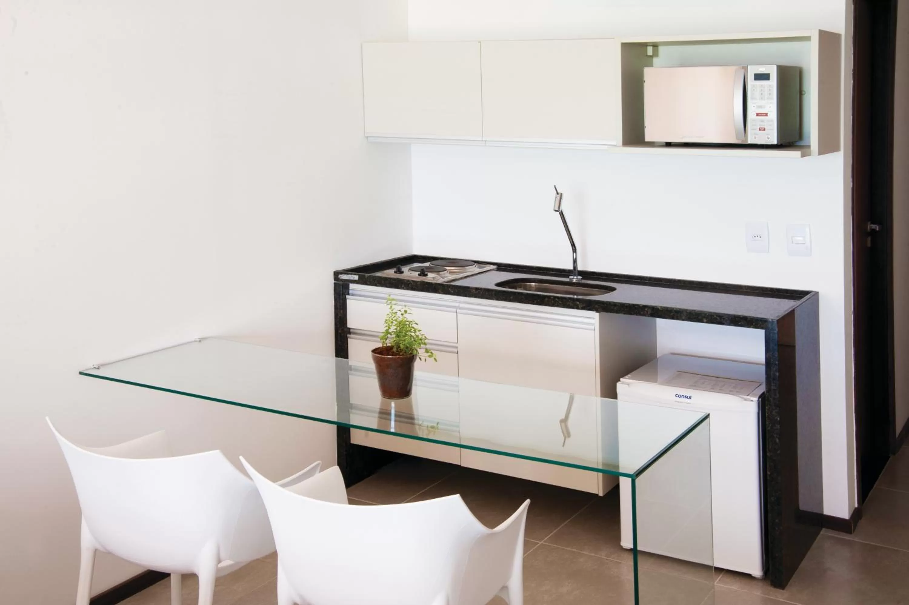 Kitchen or kitchenette in Ritz Suites Grand Hotel Boutique