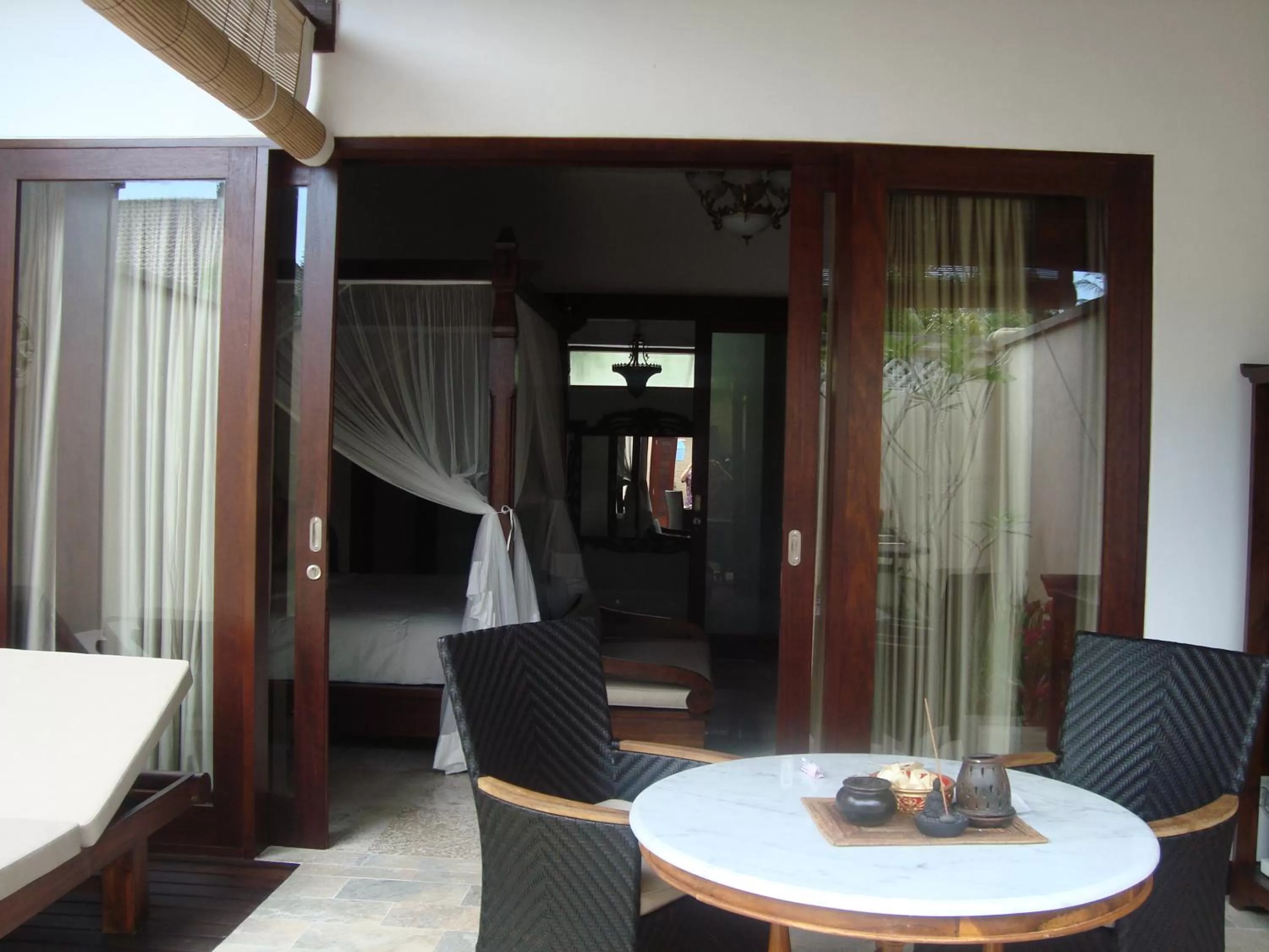 Seating area, Bed in Puri Mas Boutique Resort & Spa