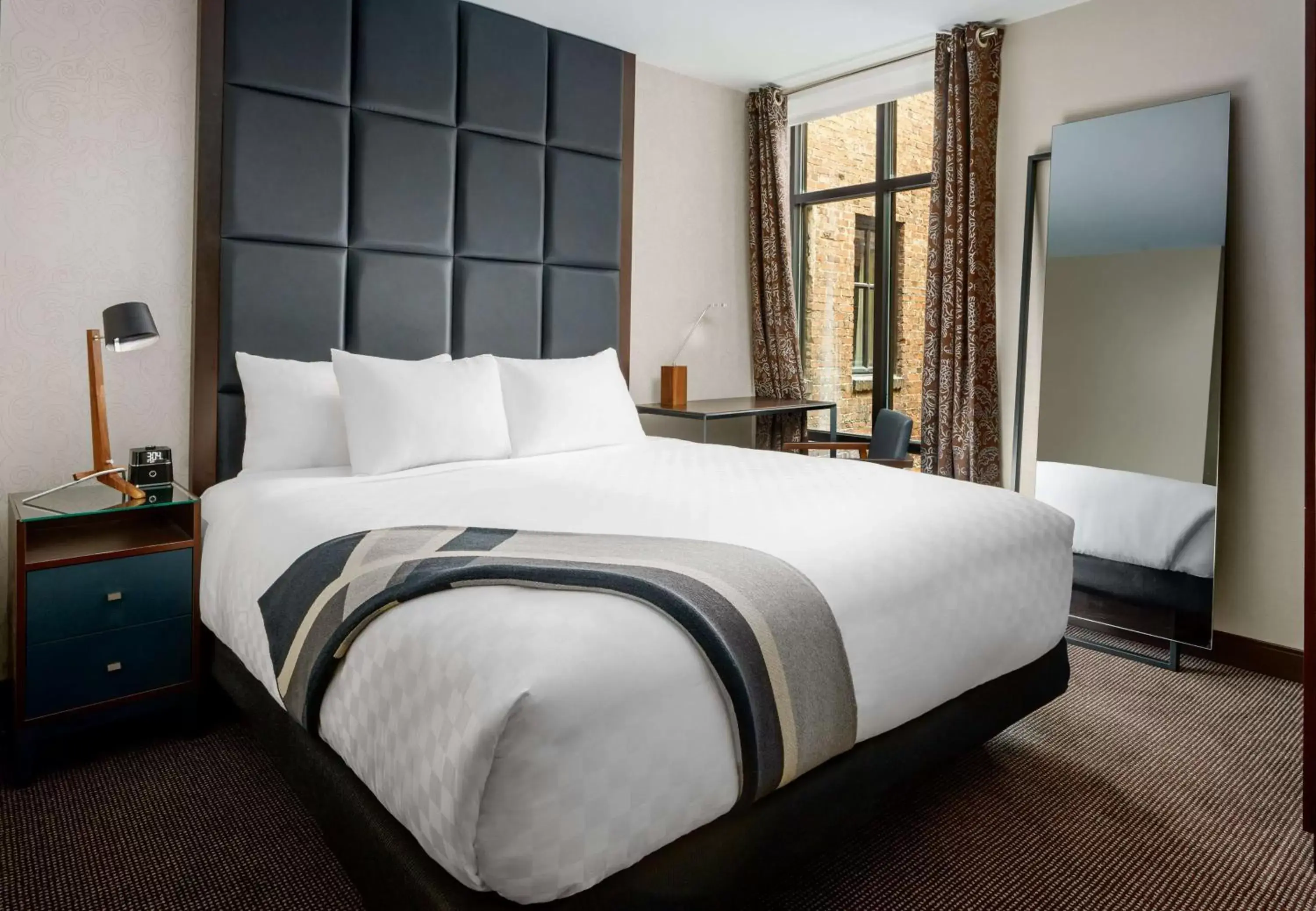 Bed in Joinery Hotel Pittsburgh, Curio Collection by Hilton