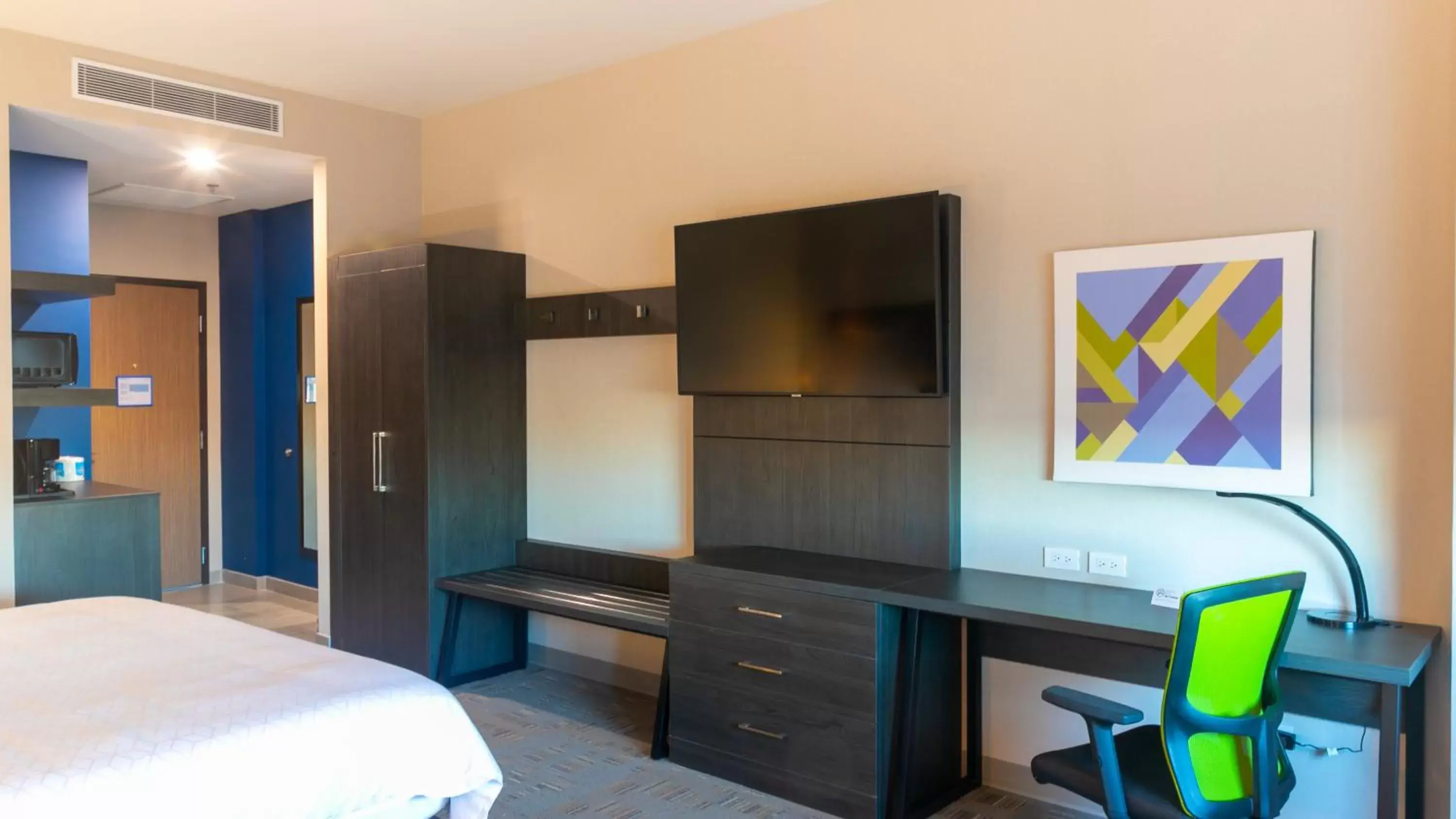 Photo of the whole room, TV/Entertainment Center in Holiday Inn Express & Suites - Tijuana Otay, an IHG Hotel