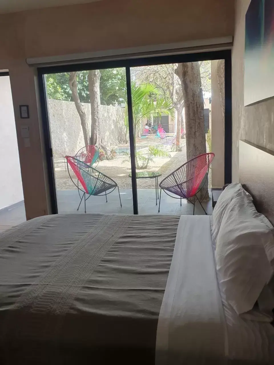 Bed in Hotelito YUM KAAX