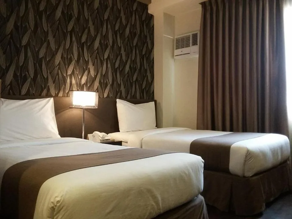 Bed in GT Hotel Iloilo