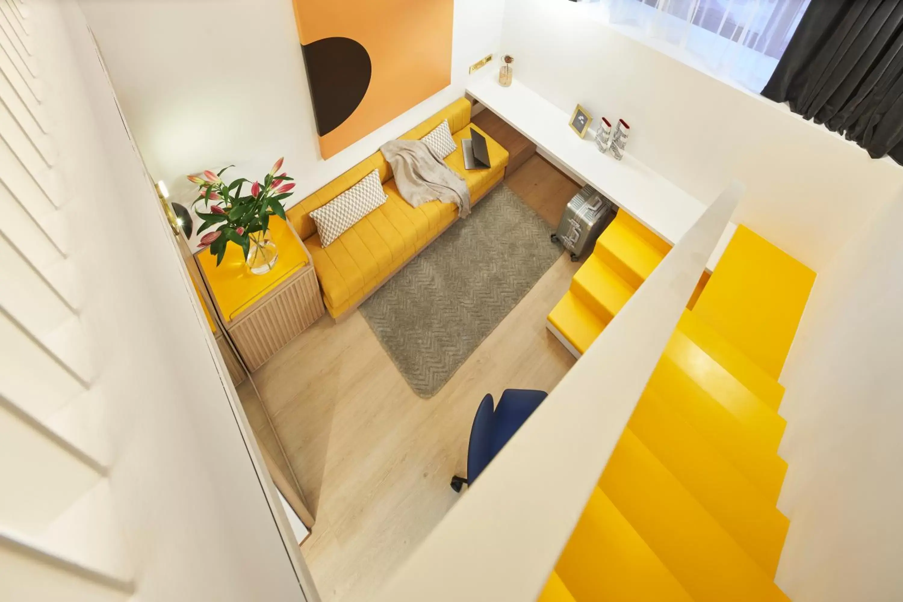 Seating area, Bed in Citadines Connect City Centre Singapore Seating area, Bed in Citadines Connect City Centre Singapore