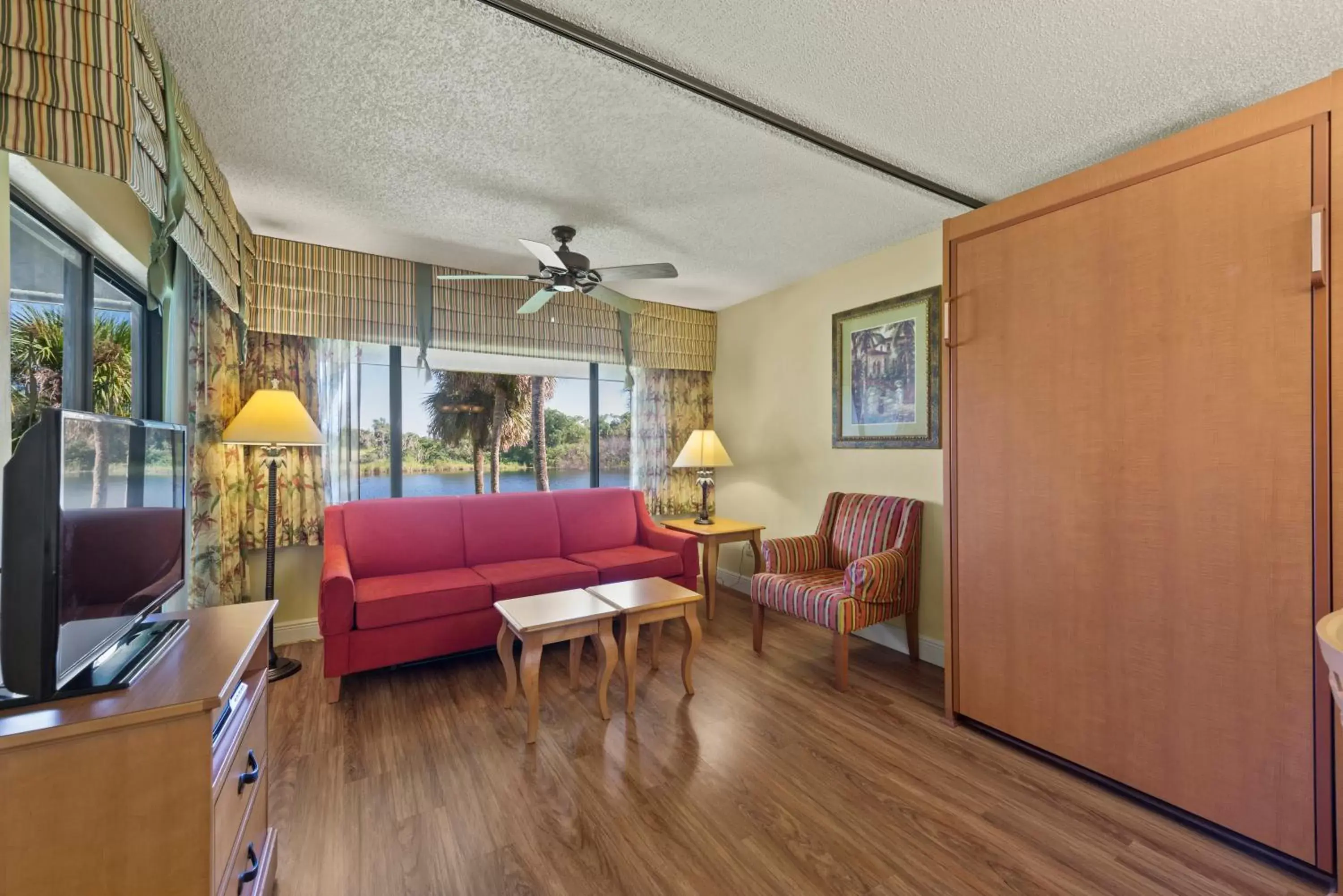 Bed, Seating Area in Lehigh Resort Club, a VRI resort