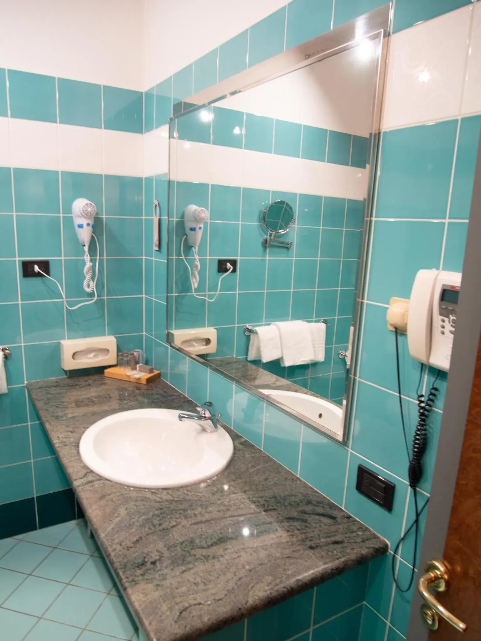 Bathroom in Hotel Tessarin