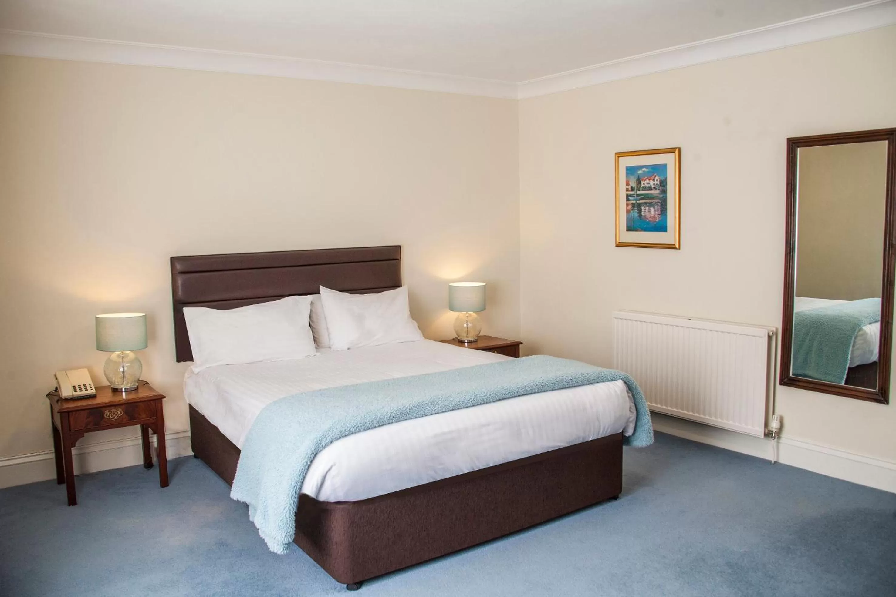 Bed in The Walnut Tree Hotel