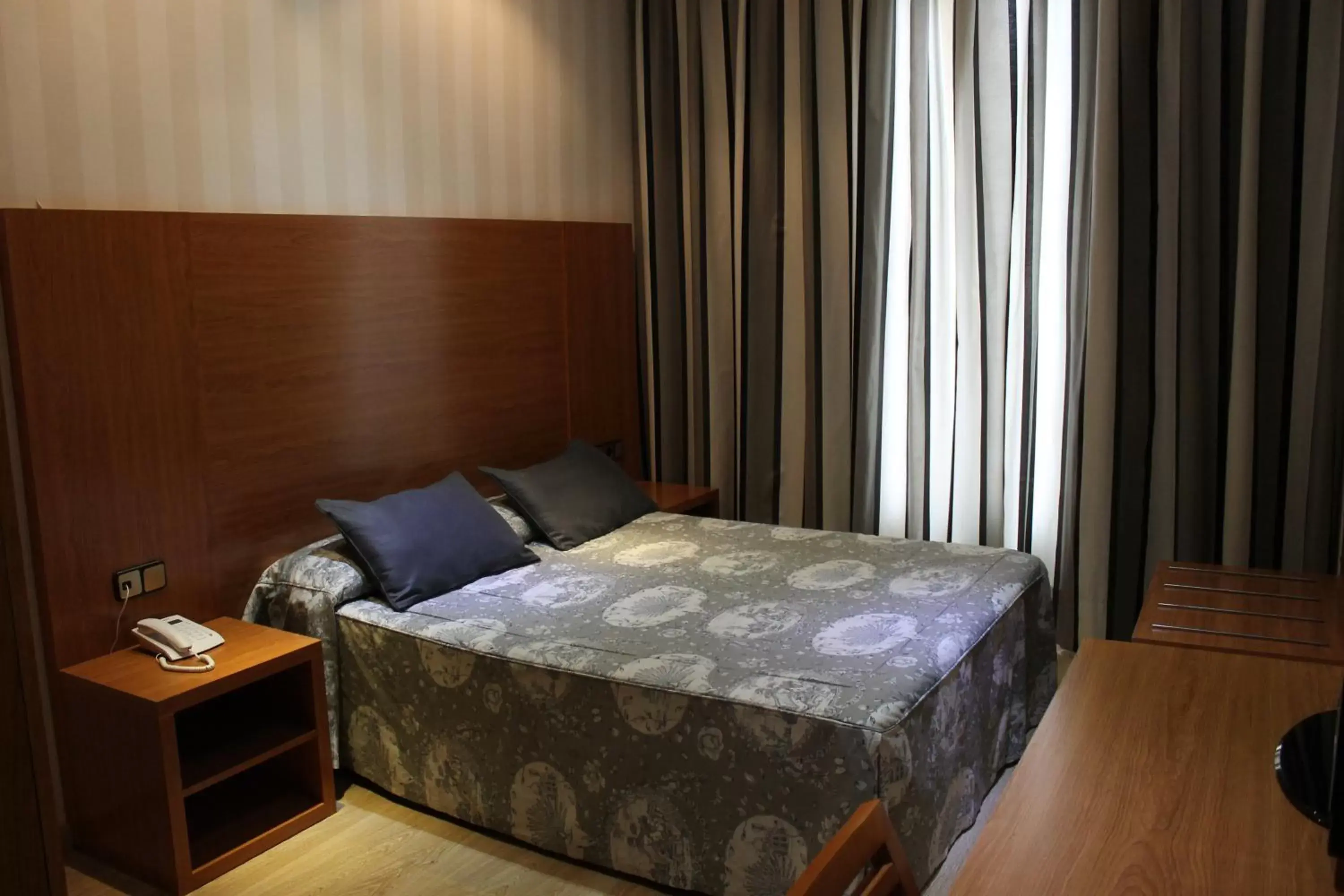 Bed in Ramblas Hotel
