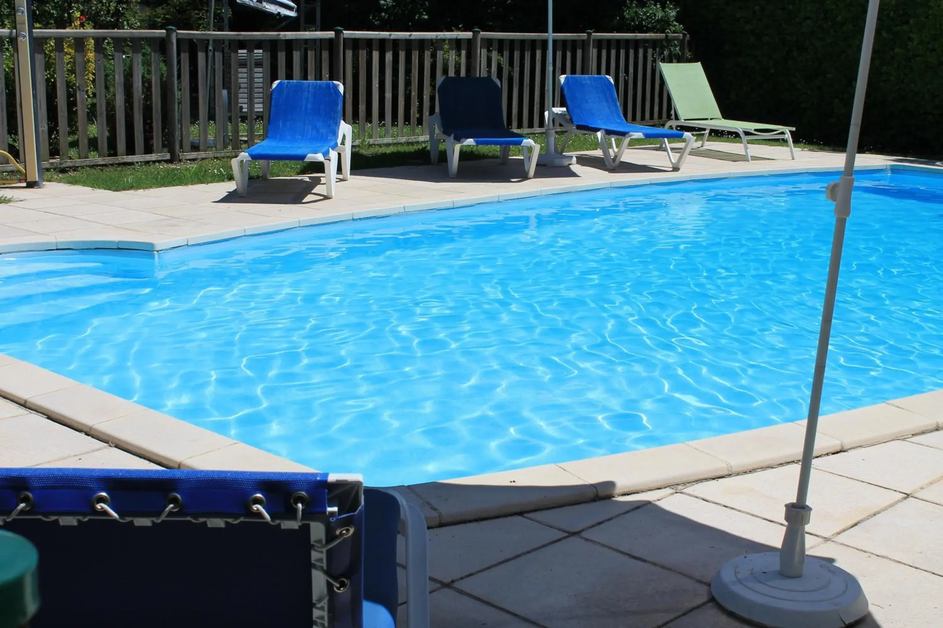 Swimming Pool in Logis Auberge de la Tour