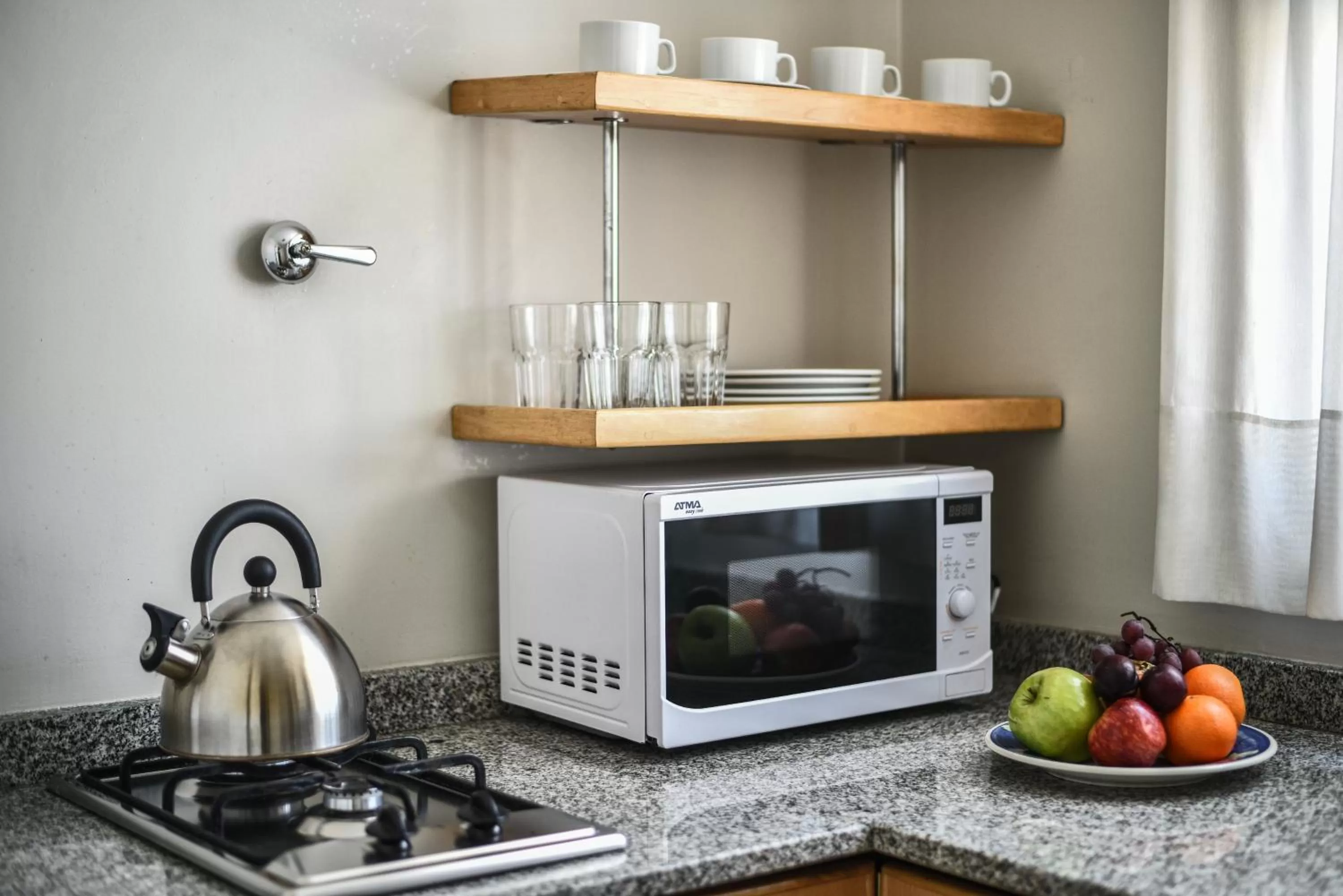 Kitchen or kitchenette in Portal Plaza Suites