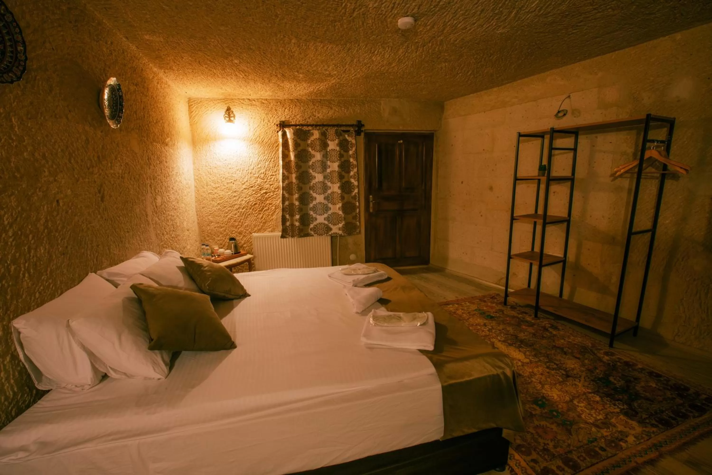 Bed in Mia Cappadocia Cave Hotel