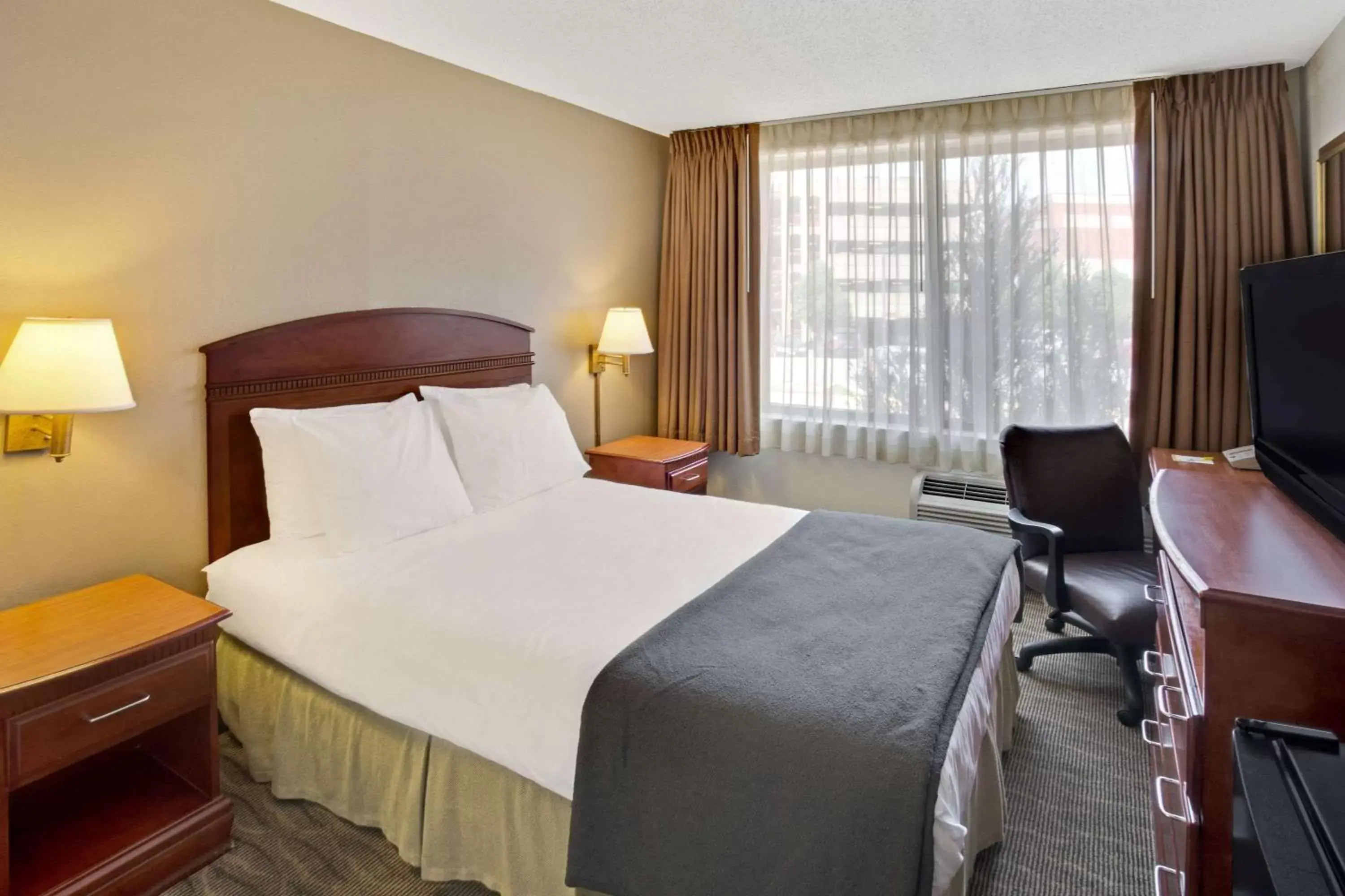 Photo of the whole room, Bed in Days Inn by Wyndham Silver Spring