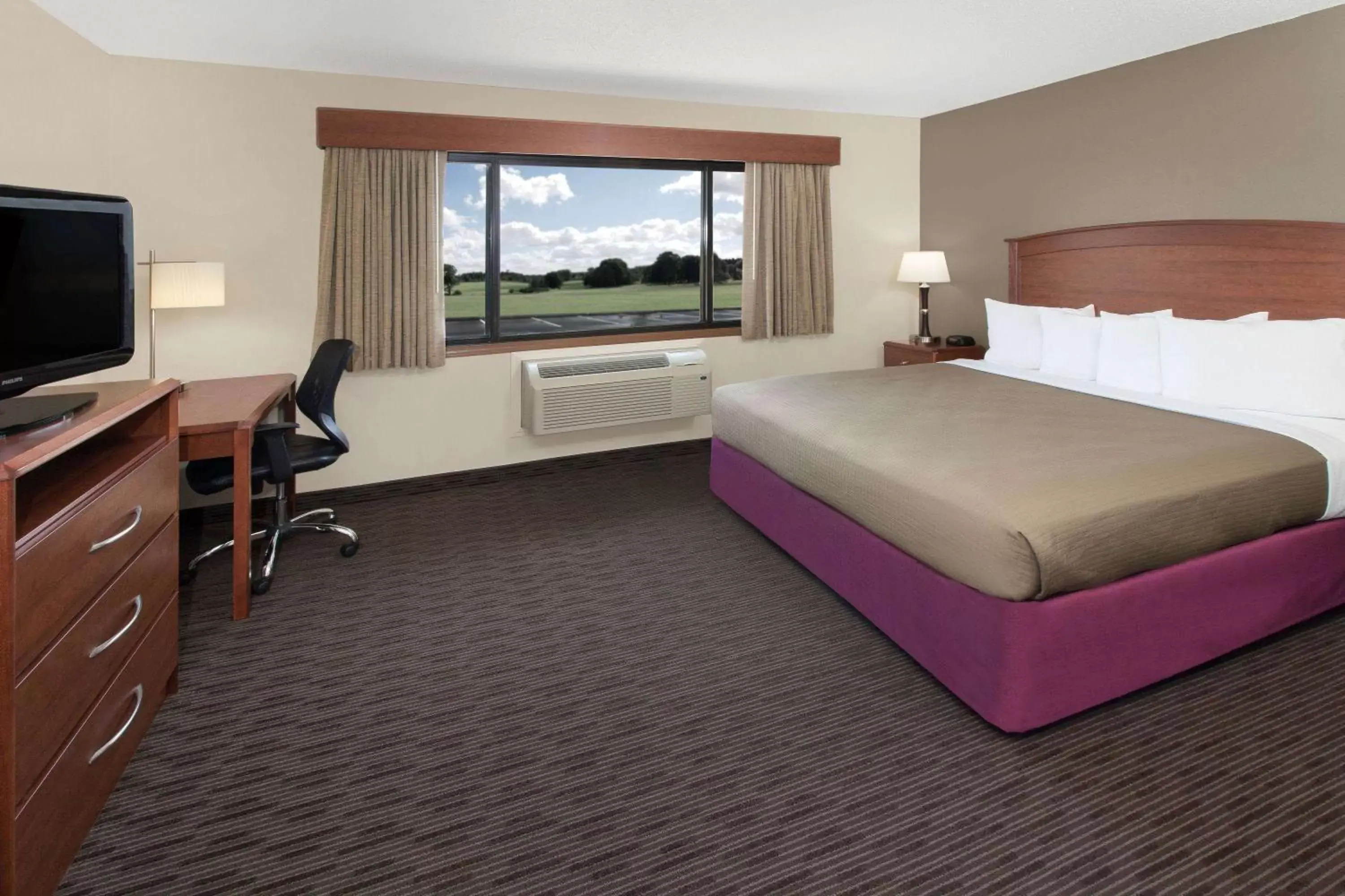 Photo of the whole room in AmericInn by Wyndham Grundy Center
