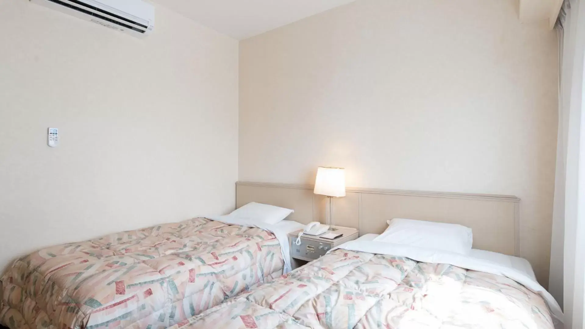 Bed in Tabist Hotel Tetora Kitakyushu Bed in Tabist Hotel Tetora Kitakyushu