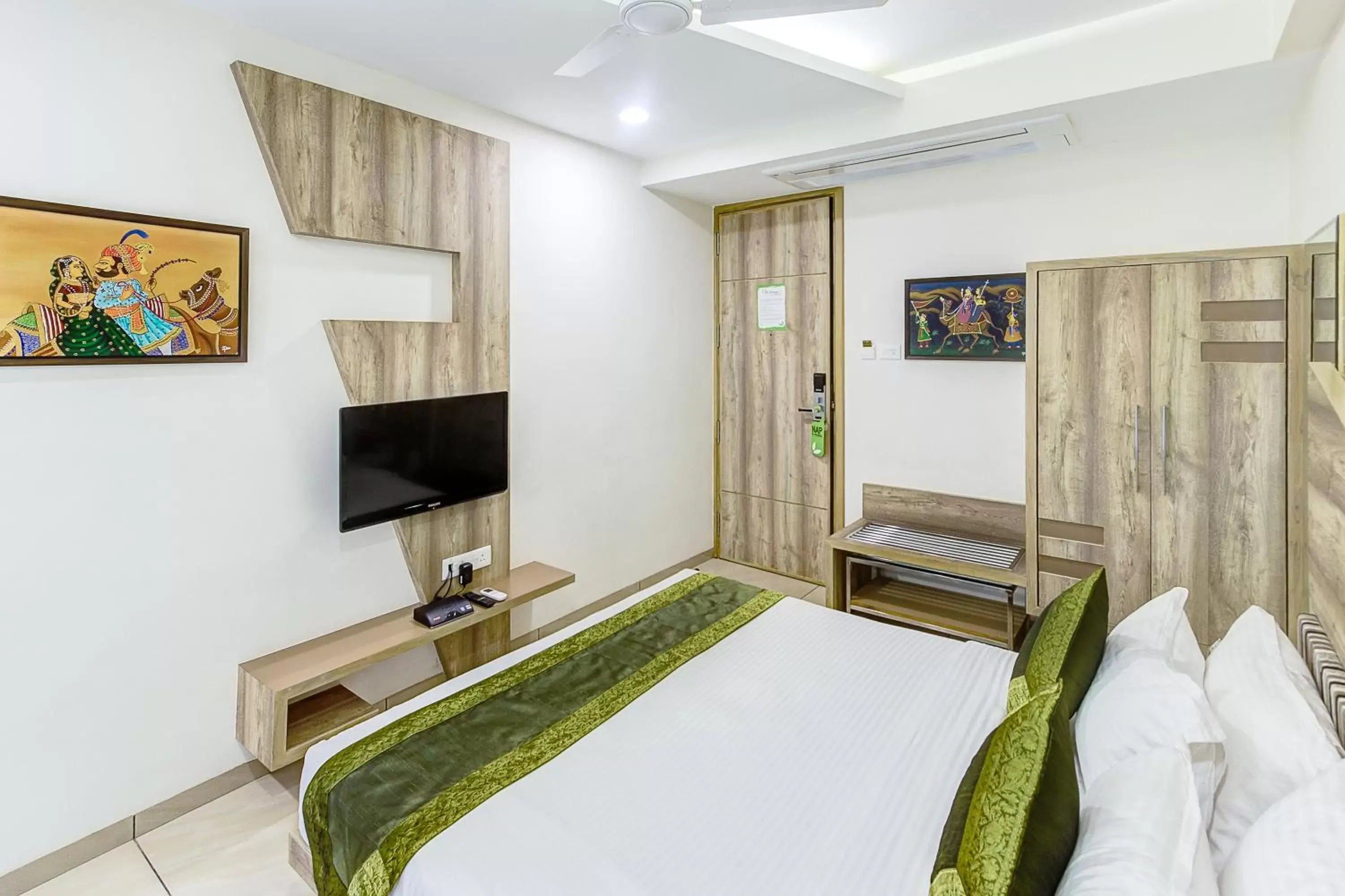 Bed, Room Photo in Treebo Trend Daksh Residency